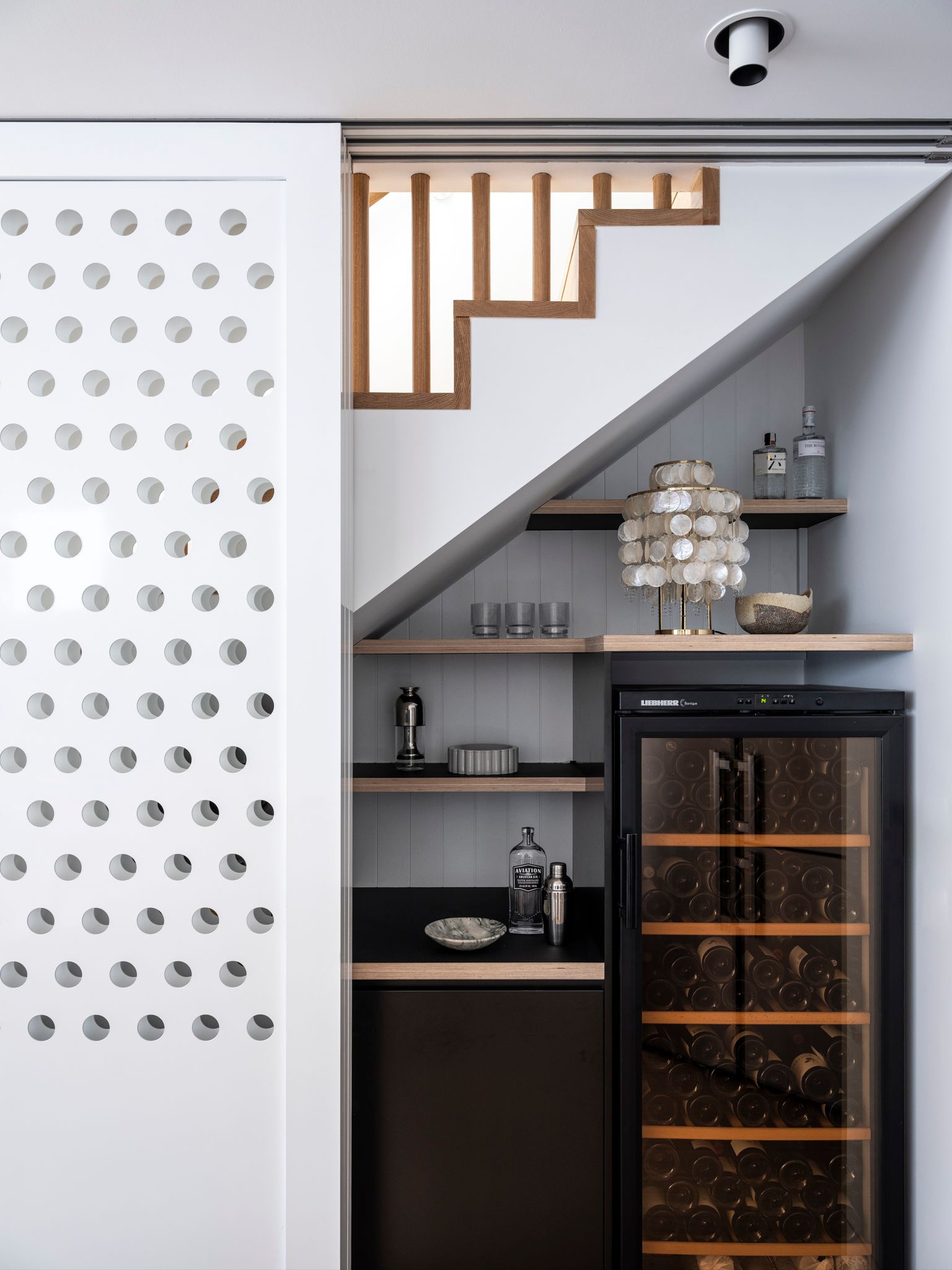 Bondi Beach House by Carla Middleton Architecture. Bar area under staircase