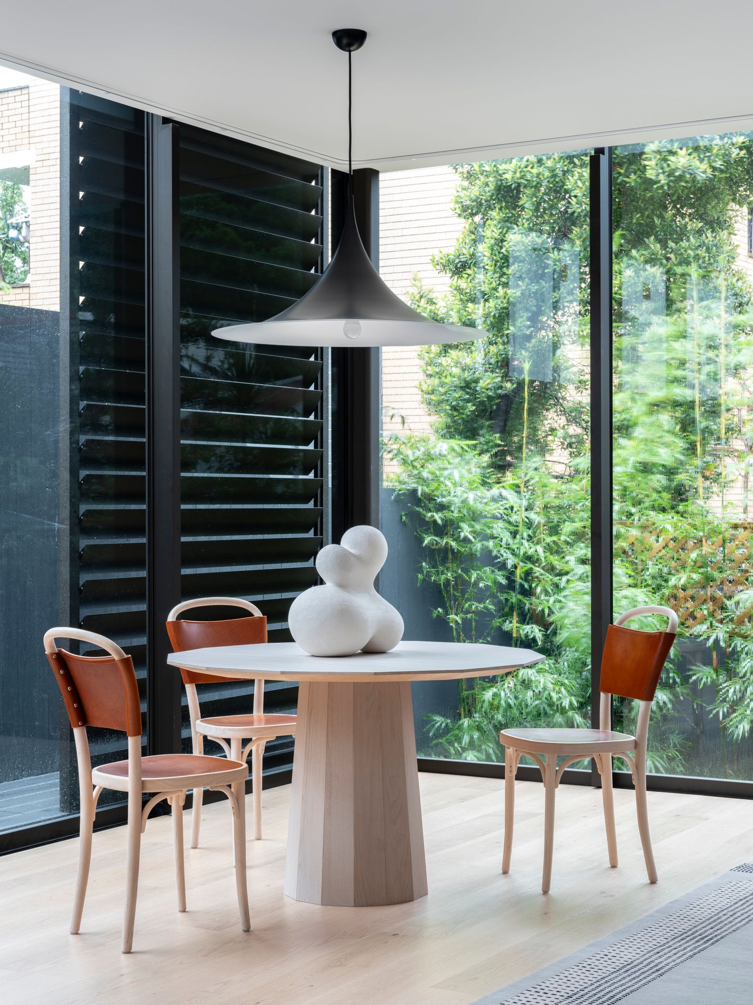 Bondi Beach House by Carla Middleton Architecture. Dining room, windows revealing outdoors 