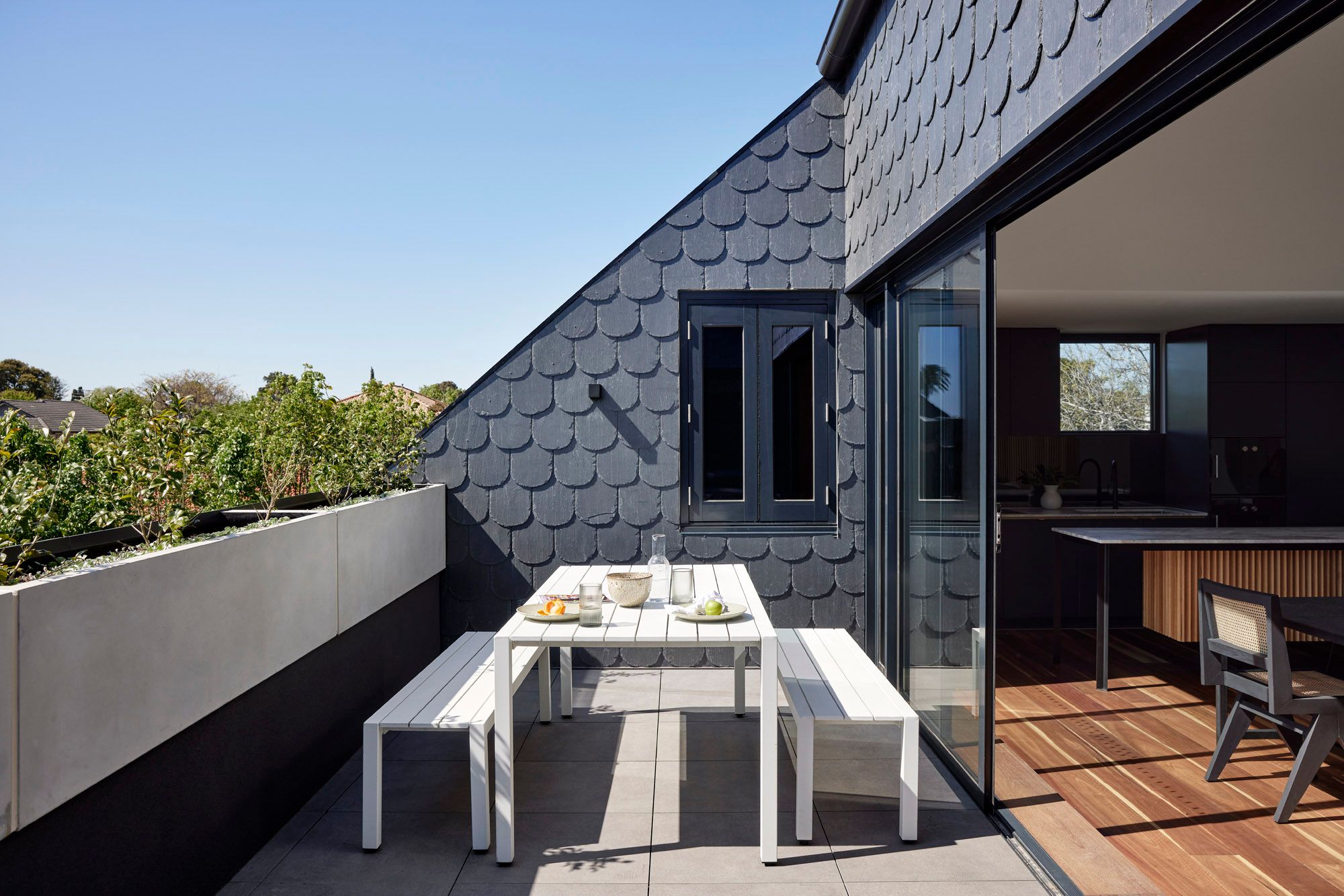 Slate House by Austin Maynard Architects. 2nd story balcony terrace view