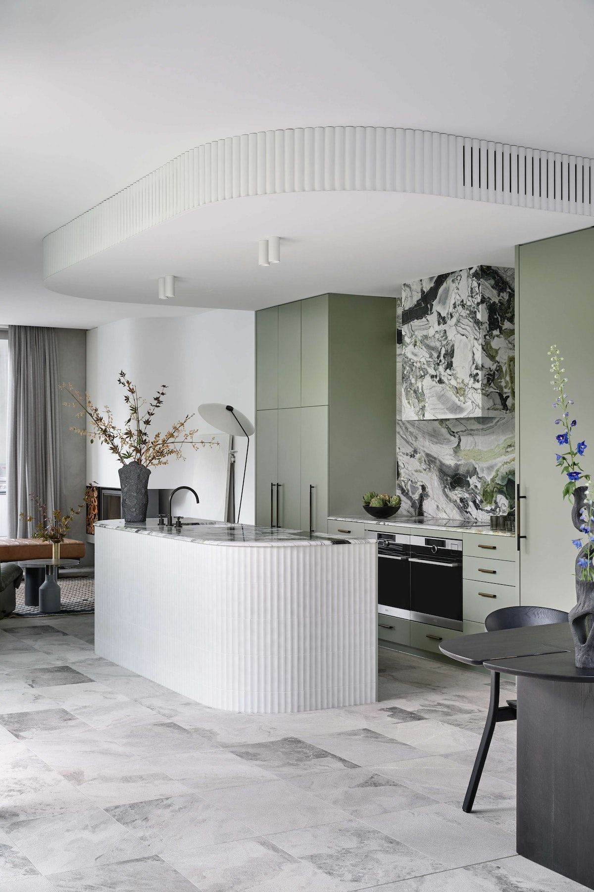 Glen Iris House by Luke Fry Architecture and Interior Design showing the green kitchen joinery and island bench