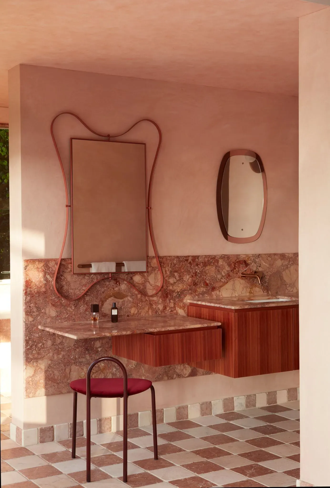 La Palma by YSG Studio. Ciew into power room, featuring custom marble basin.