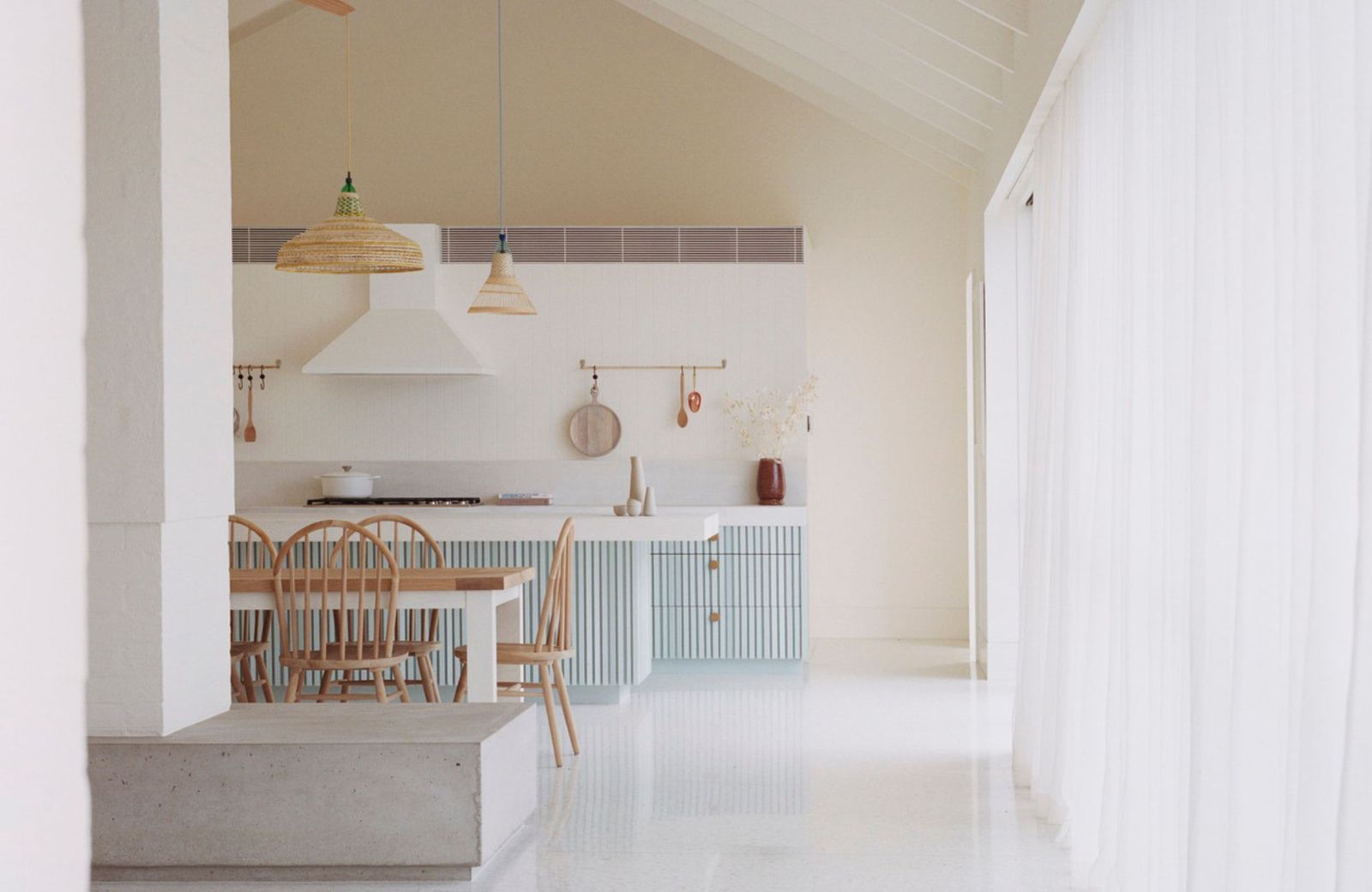 Sorrento Beach House by Pandolfini Architects. View into kitchen dining room, soft pastelle colour scheme