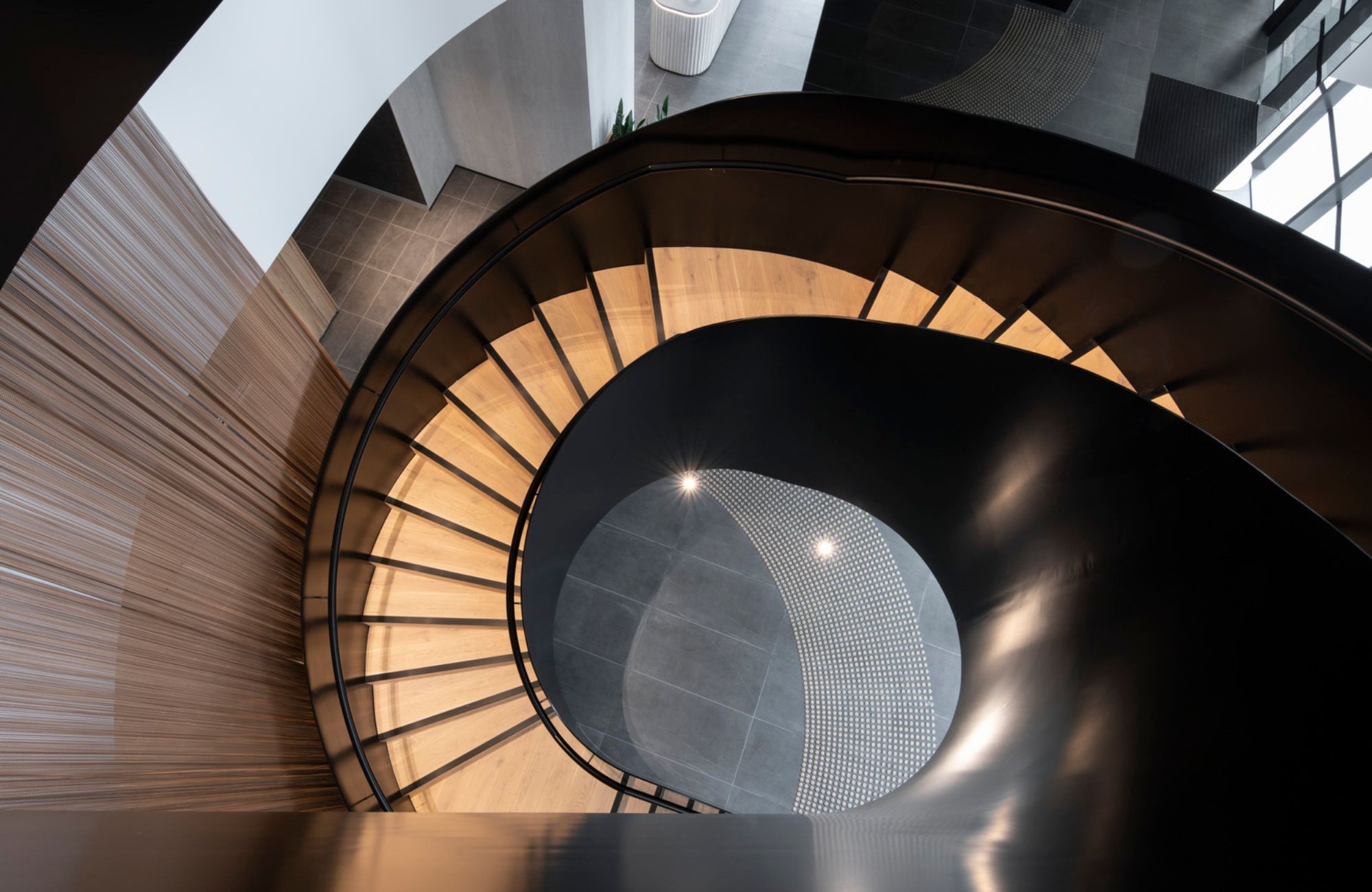 The Langston Residence by Architectus. Birds eye view of the Lanston's spiral staircase