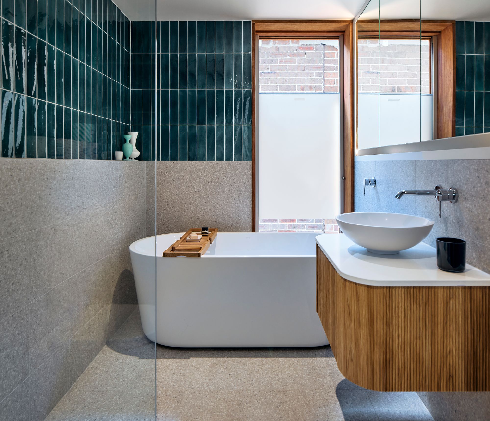Urban Masseria by Kreis Grennan Architects. Bathroom view featuring bathtub and vanity. 