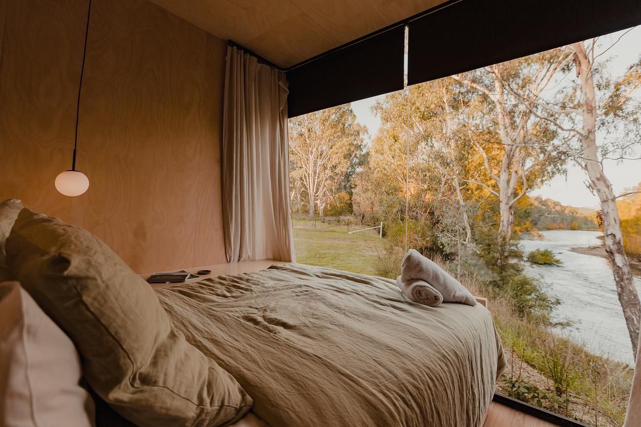 Cortes Cabin by Cortes Stays. Interior Cabin view from bed out to surrounding property