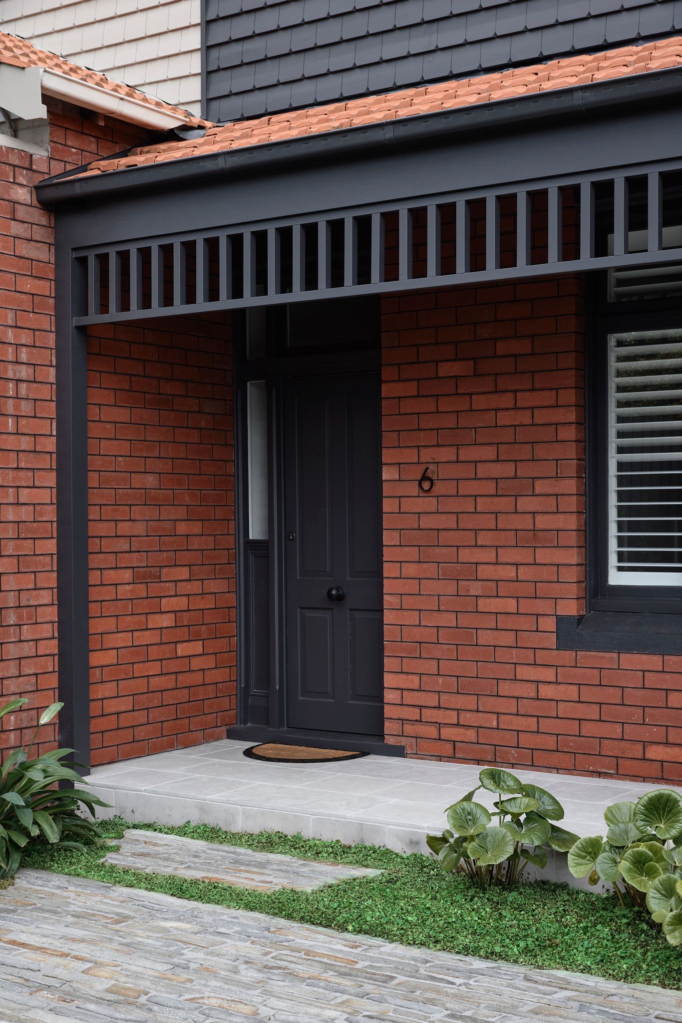 Silvertop House by Tom Robertson Architects. Front facade featuring orginal Edwardian ornate detailing