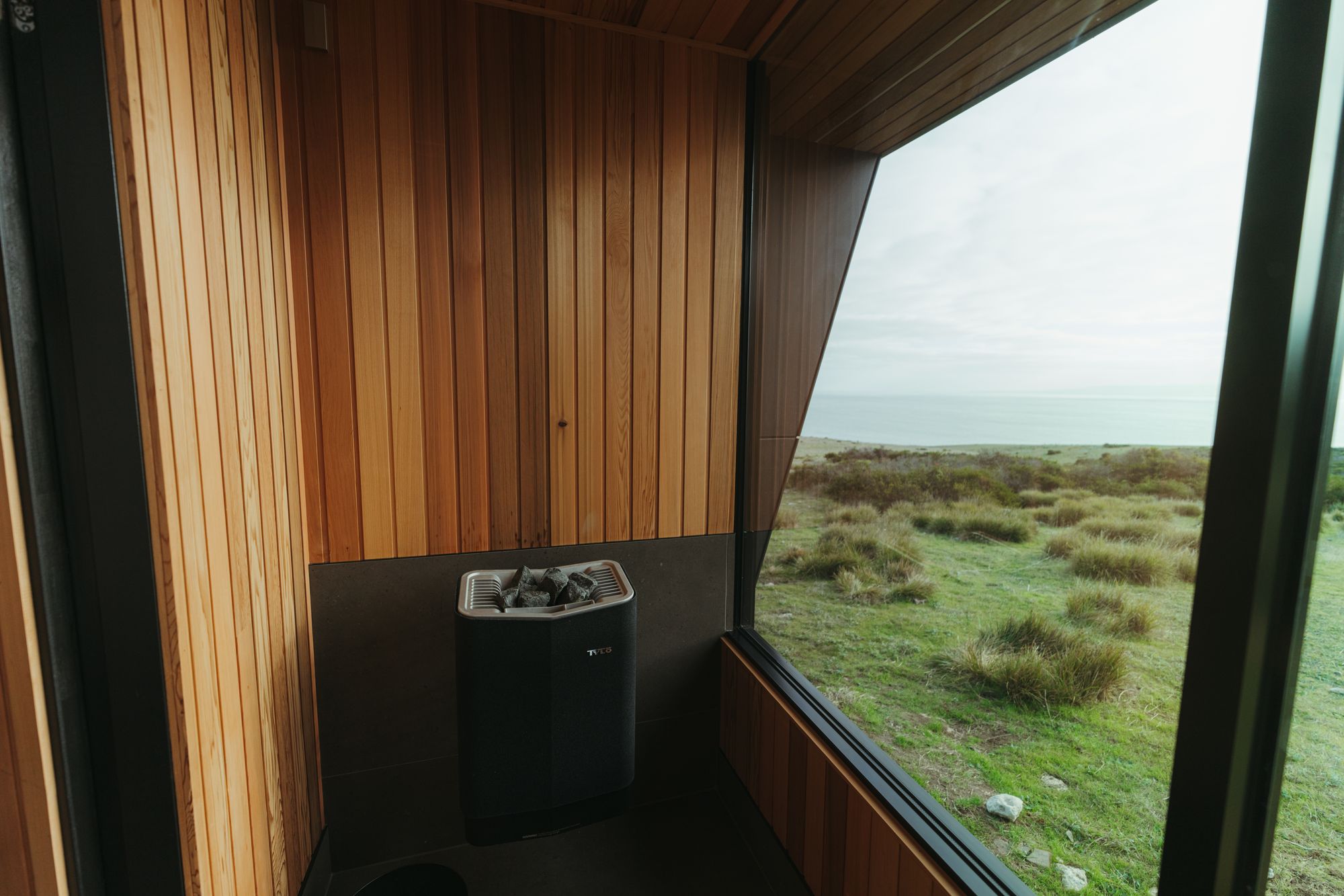 CABN X Cape St Albans. Sauna with views out to property.