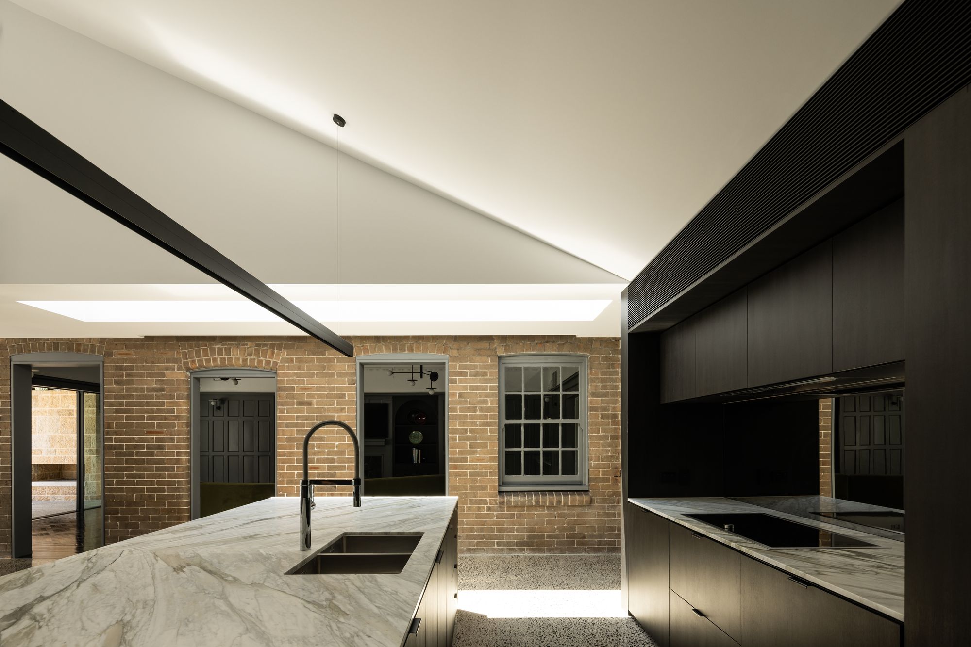 Tongkah by MCK Architects. New rear dwelling featuring contemporary kitchen and dining area. 