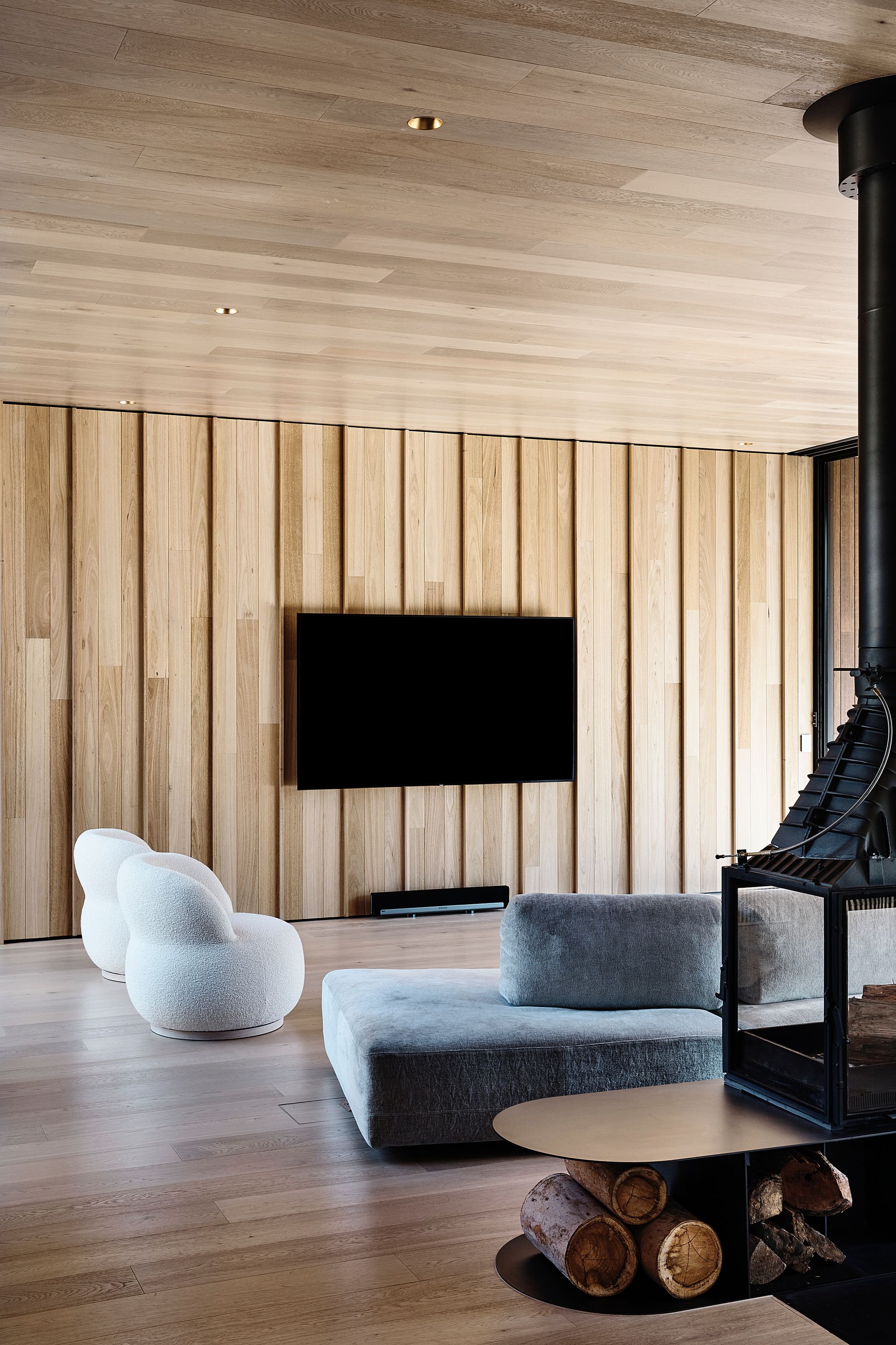 Brimar House by Michael Ong Design Office. Family's private residence on second level, featuring living room. 