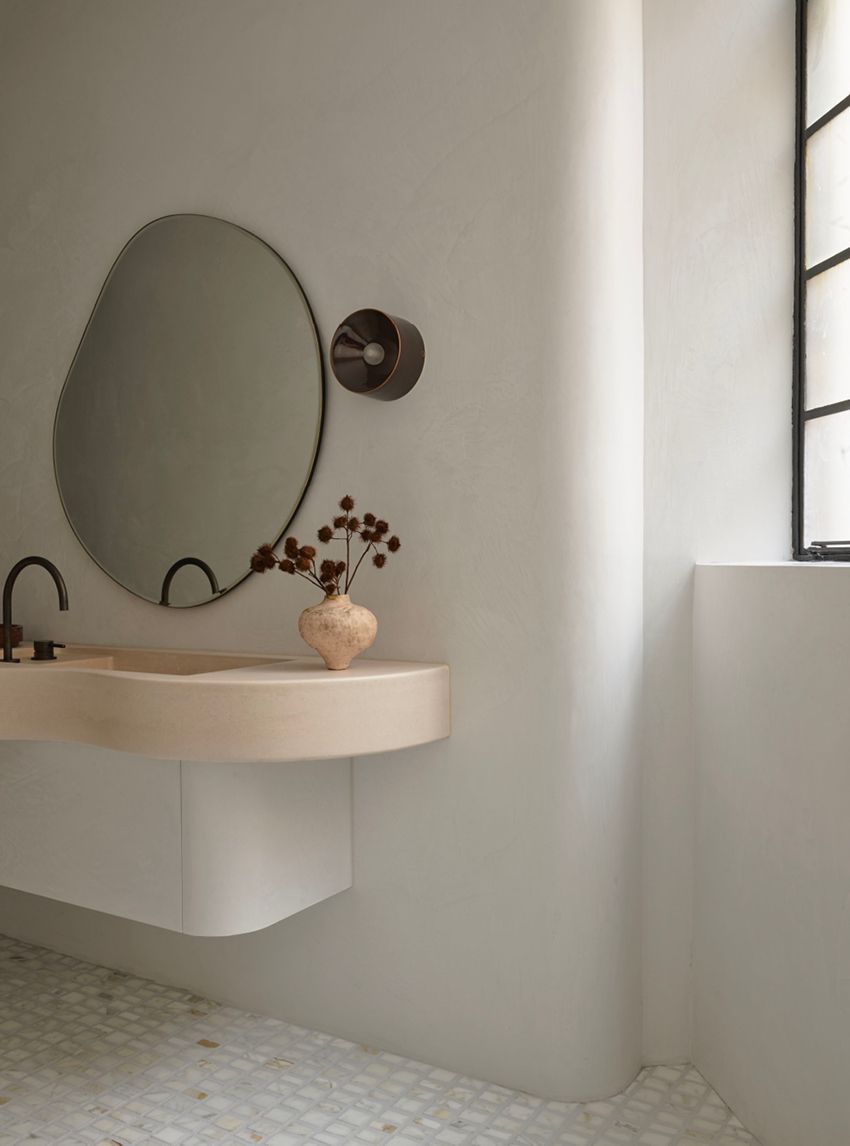 NoMad by Alexander & CO. Bathroom featuring soft fluid forms. 