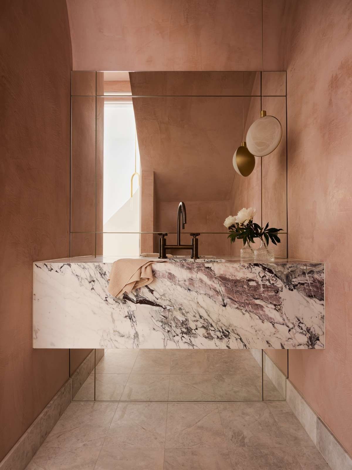 First Blush by Smac Studio. Blush themed bathroom featuring marble basin. 