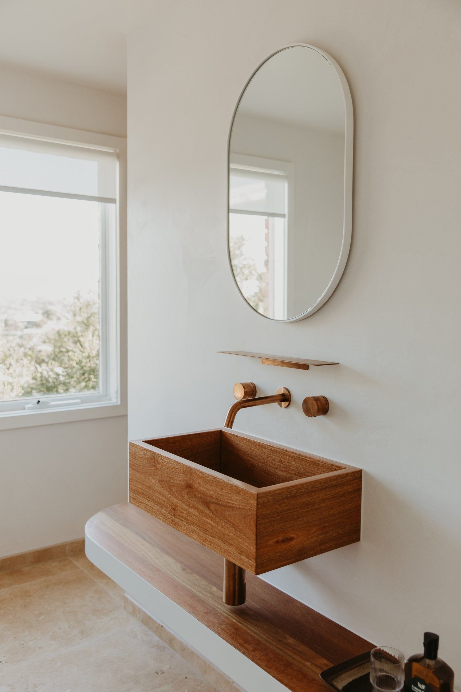 Camillo House by Camillo. An Escape project featuring a bathroom vanity with a beige wall