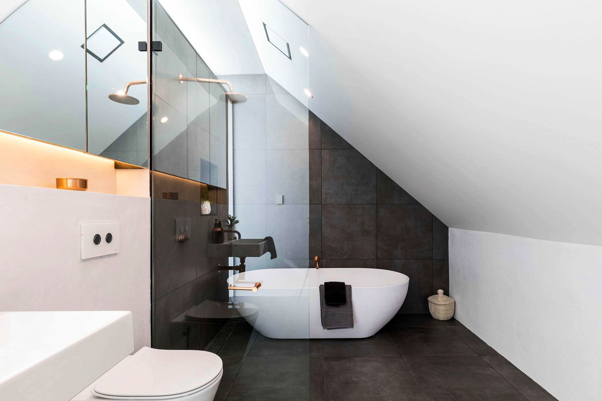 Darlinghurst Residence by JKMarchitects showing internal view of bathroom with standalone bathtub