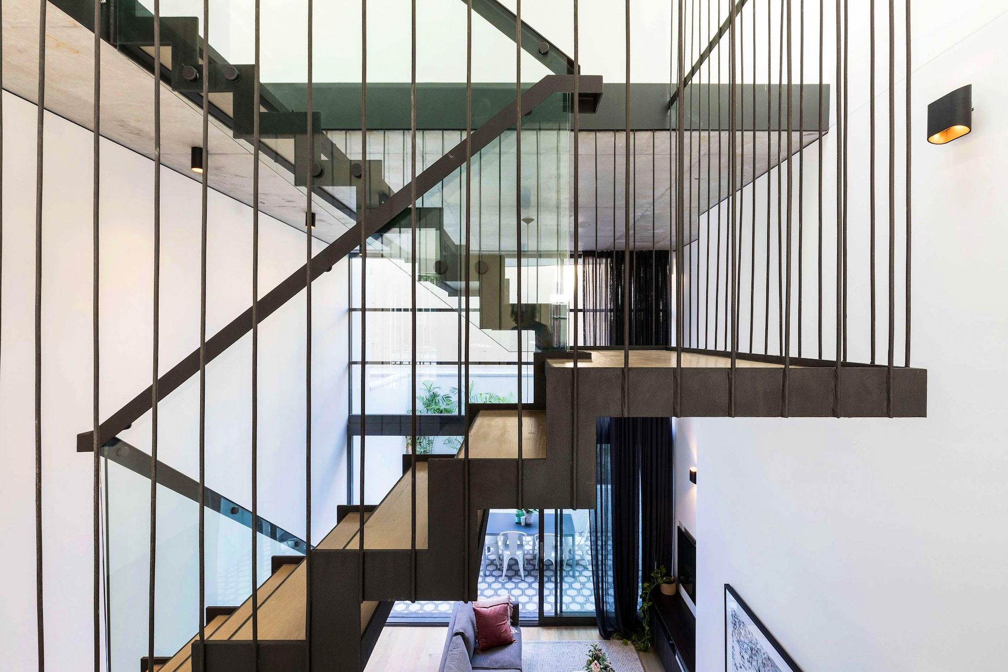 Darlinghurst Residence by JKMarchitects showing feature stair