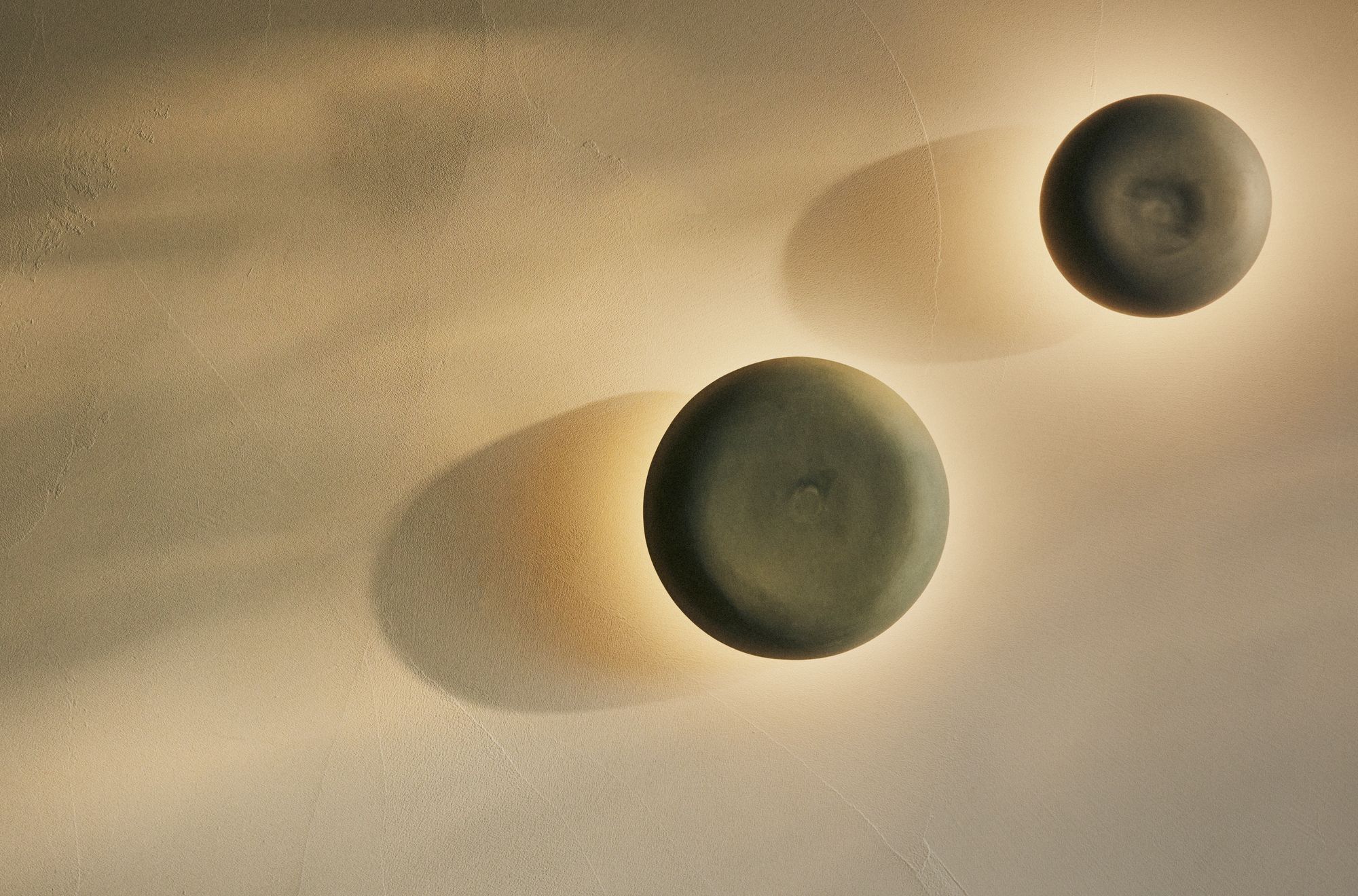 Studio Enti Eclipse Sconce in a two size variations. 