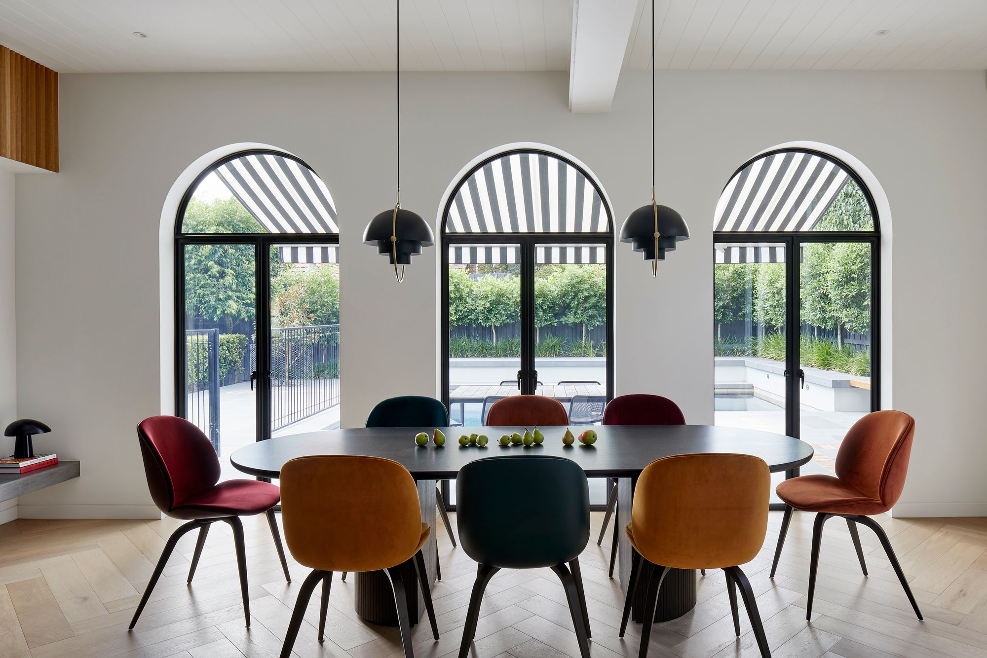 Arch Deco by Hindley & Co. Arch Deco Project, Featuring dining room area with view out to Garden. 