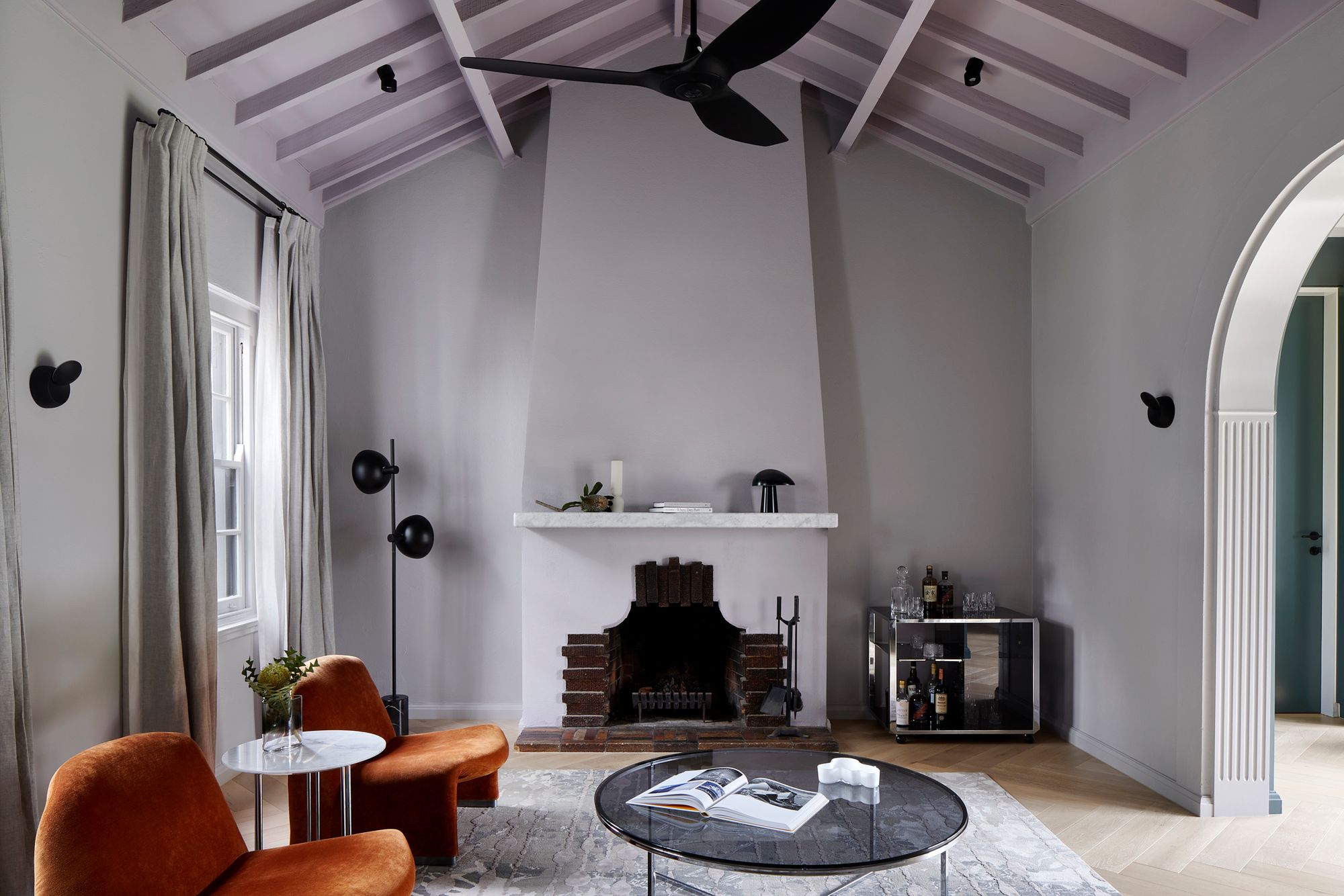 Arch Deco by Hindley & Co.  Arch Deco Project view of formal living room area, with feature fireplace. 