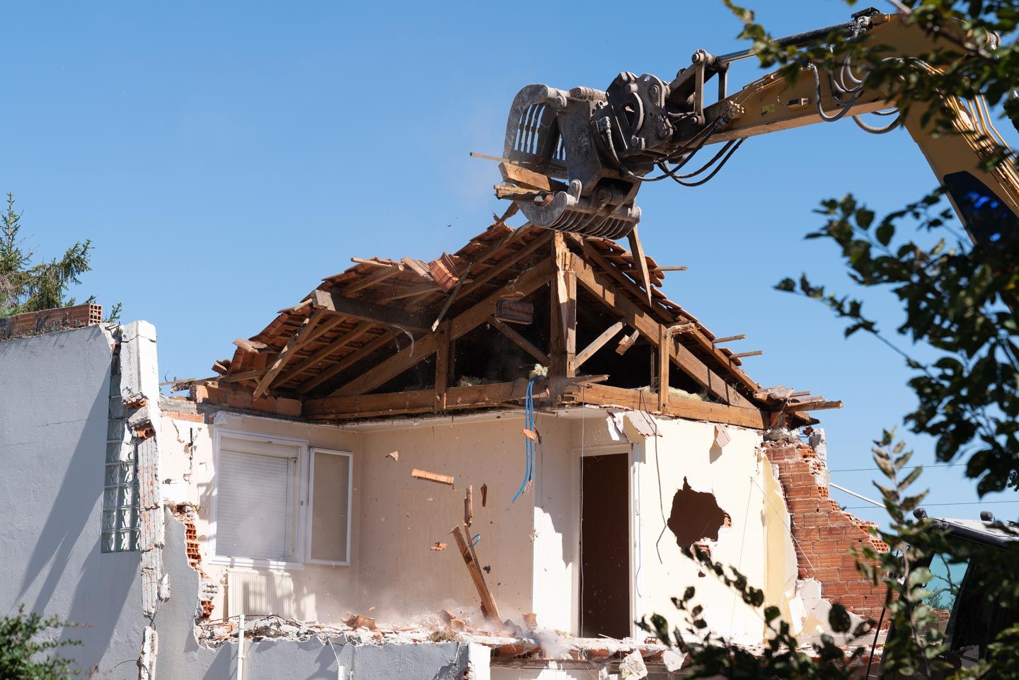 A family assessing the previous condition of their home