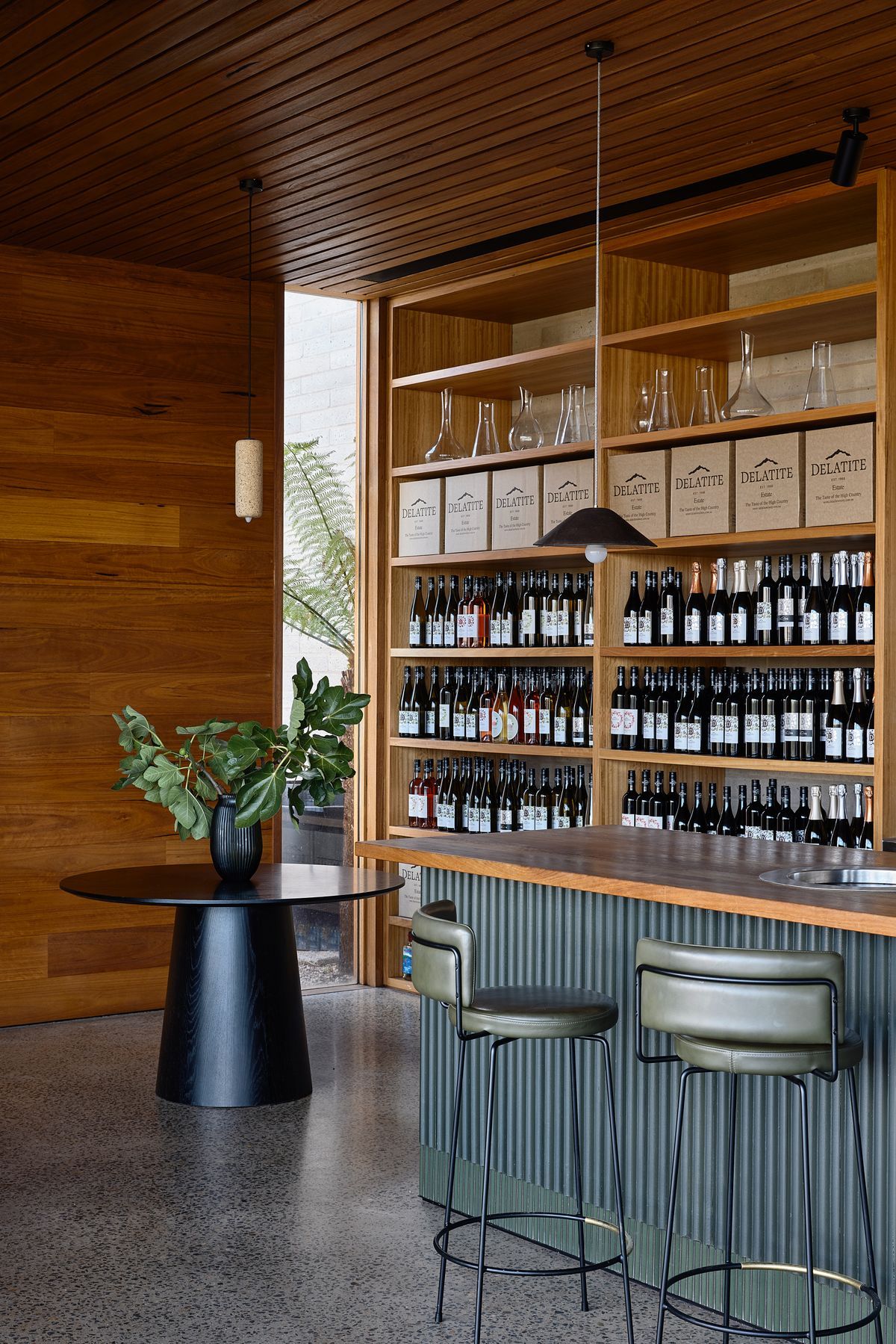 Delatite Cellar Door by Lucy Clemenger Architects. Bar view, featuring Delatite's selection of wines. 