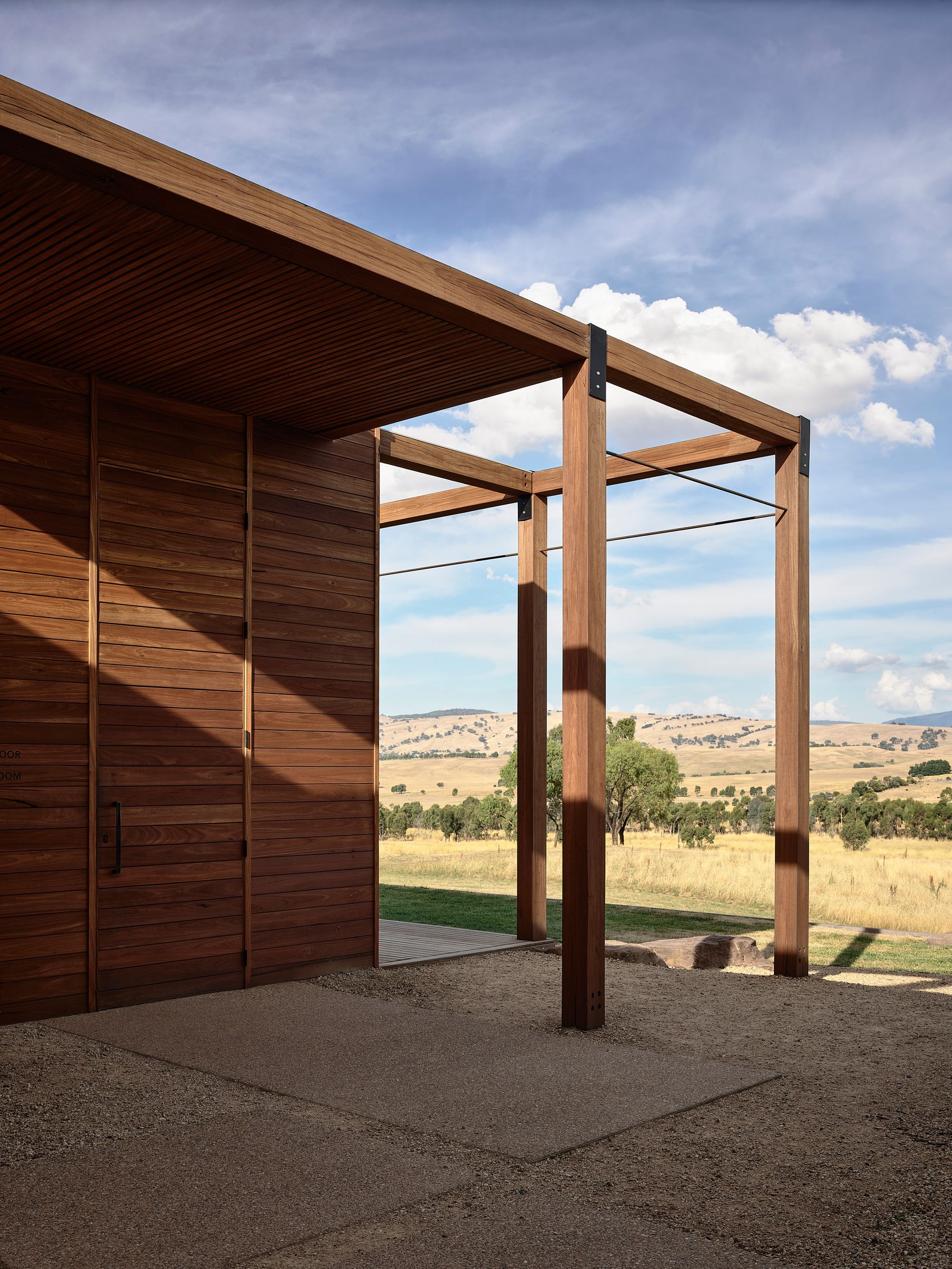Delatite Cellar Door by Lucy Clemenger Architects. Side view of Delatite looking out to property. 