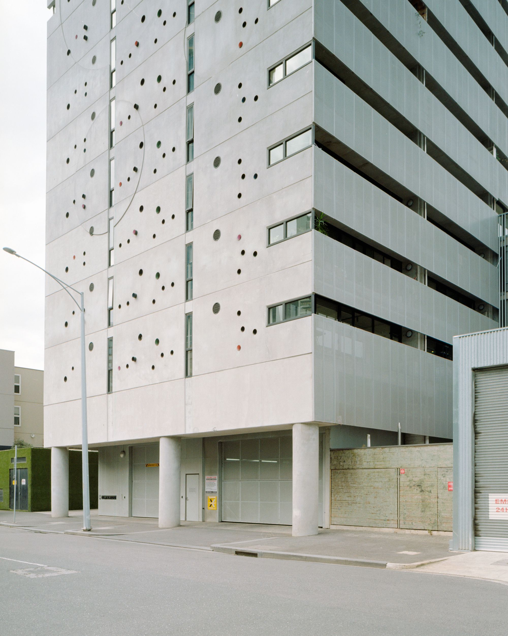 Guild Apartments by Peddle Thorp Architects. Street view of Apartments. 