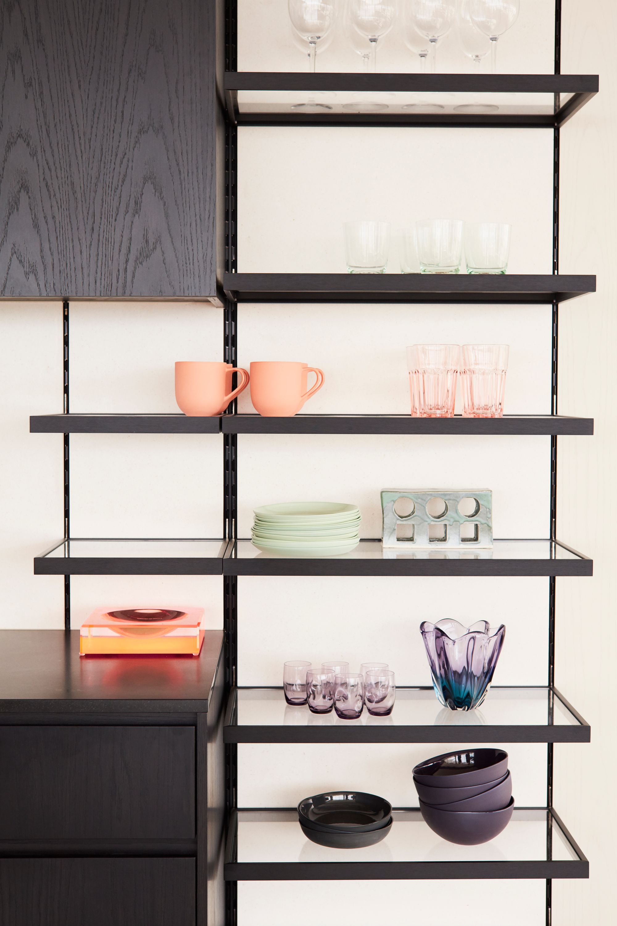 Dream Weaver by YSG Studio. kitchen display shelving with a range of glass and table ware. 