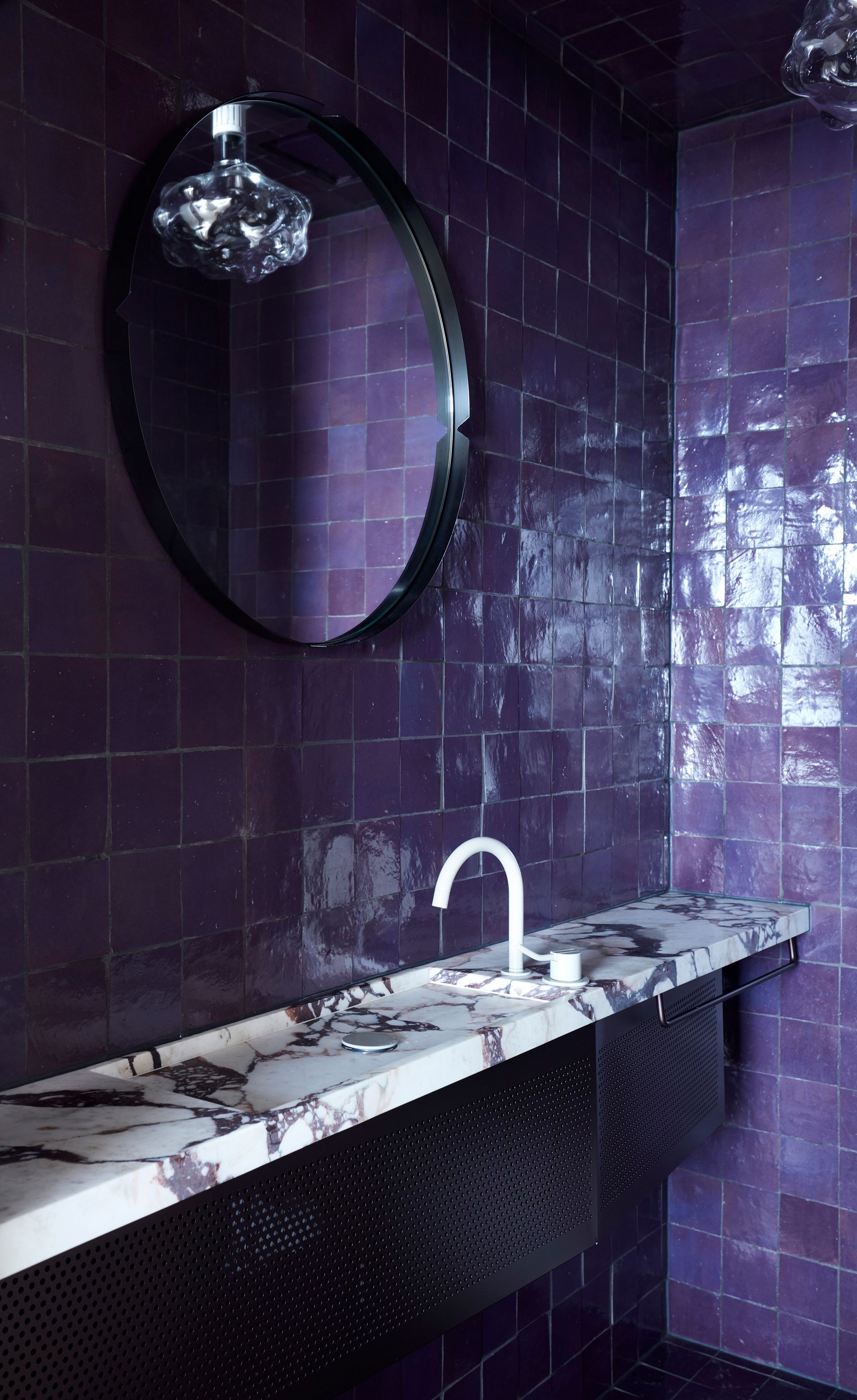 Dream Weaver by YSG Studio. Powder room with feature purple tiling