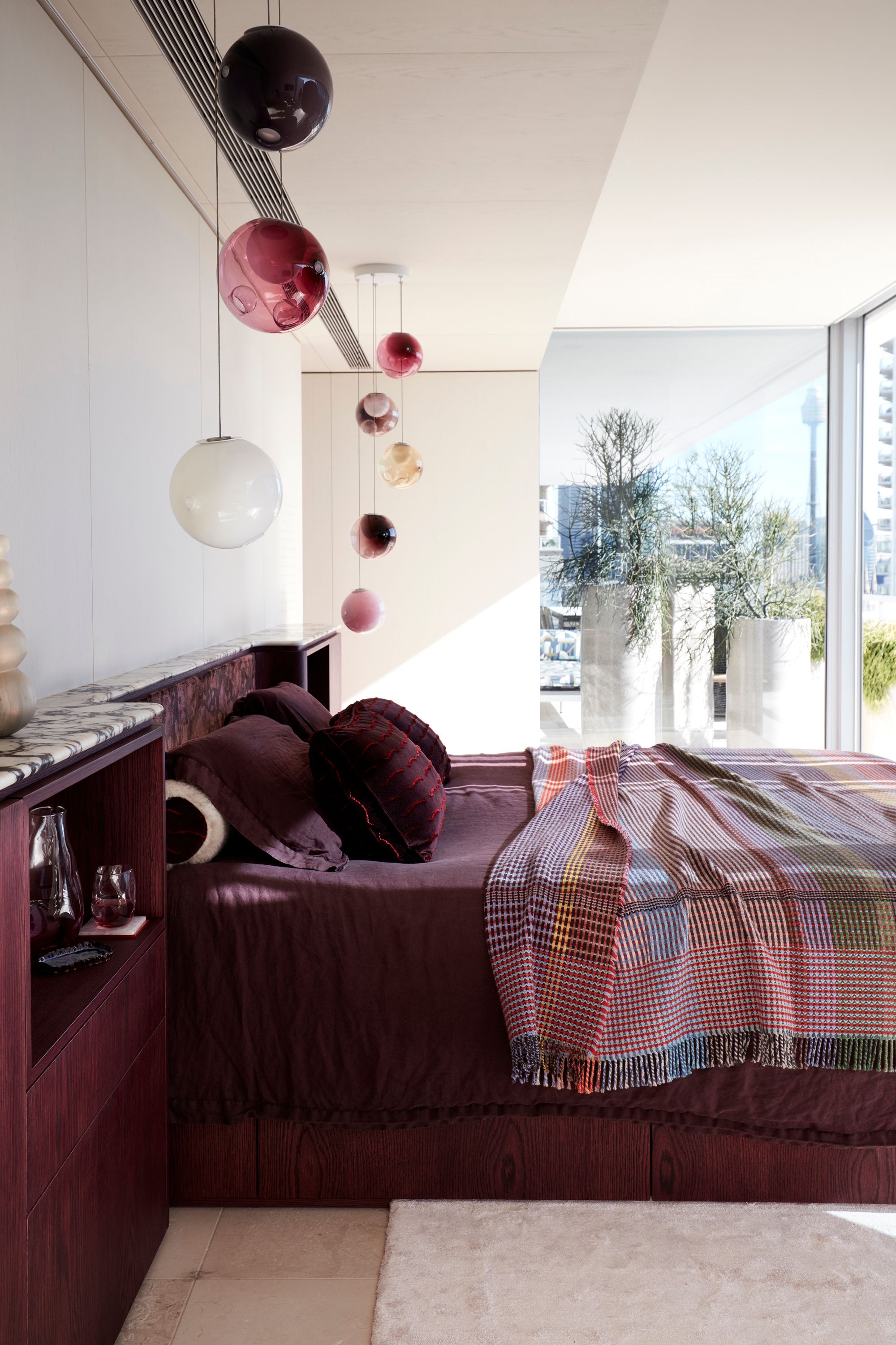 Dream Weaver by YSG Studio. Master bedroom, plum accent
