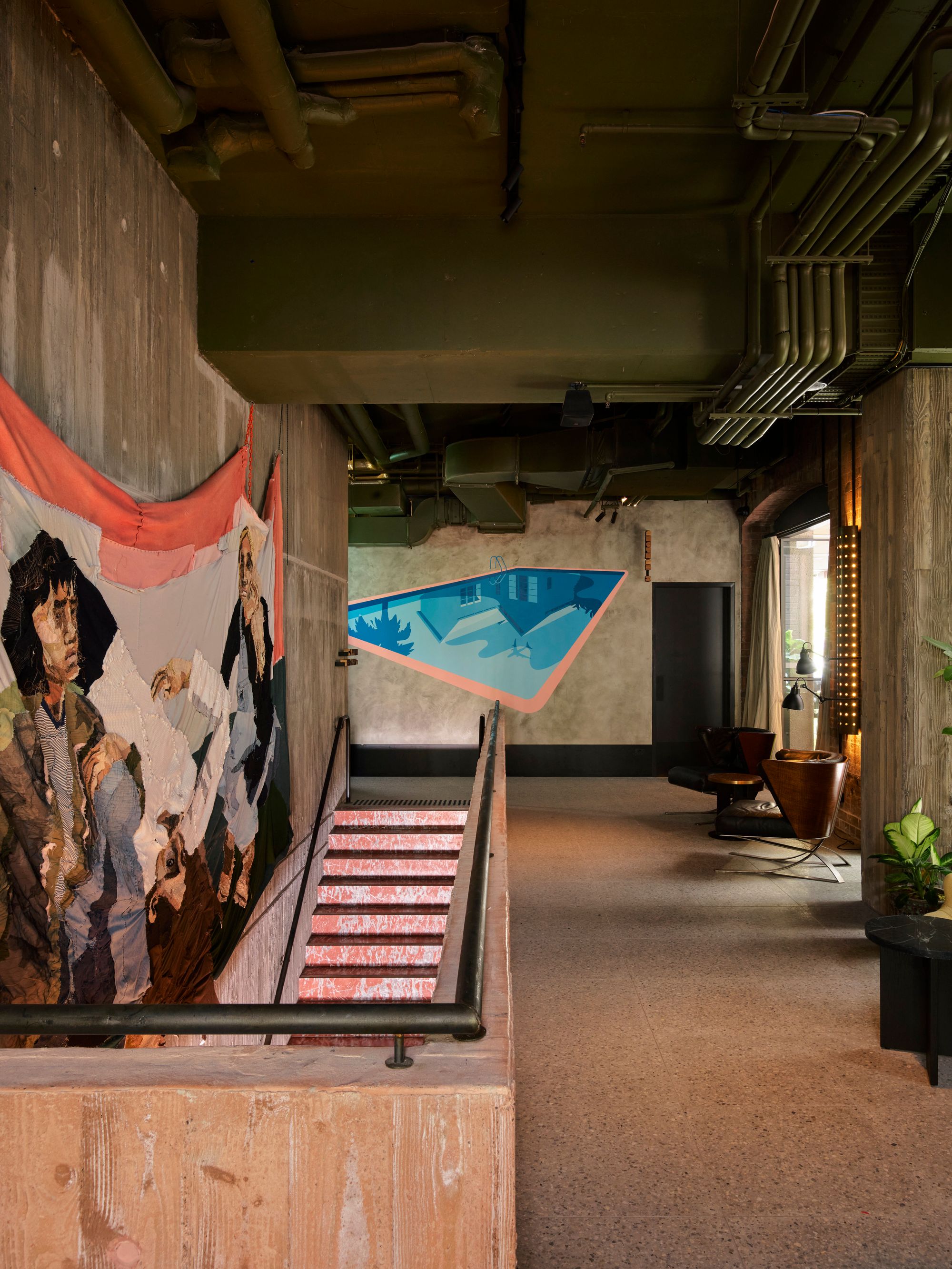 Ace Hotel Sydney. Foyer first floor level, featuring terracotta and ochre steps down to entrance. 