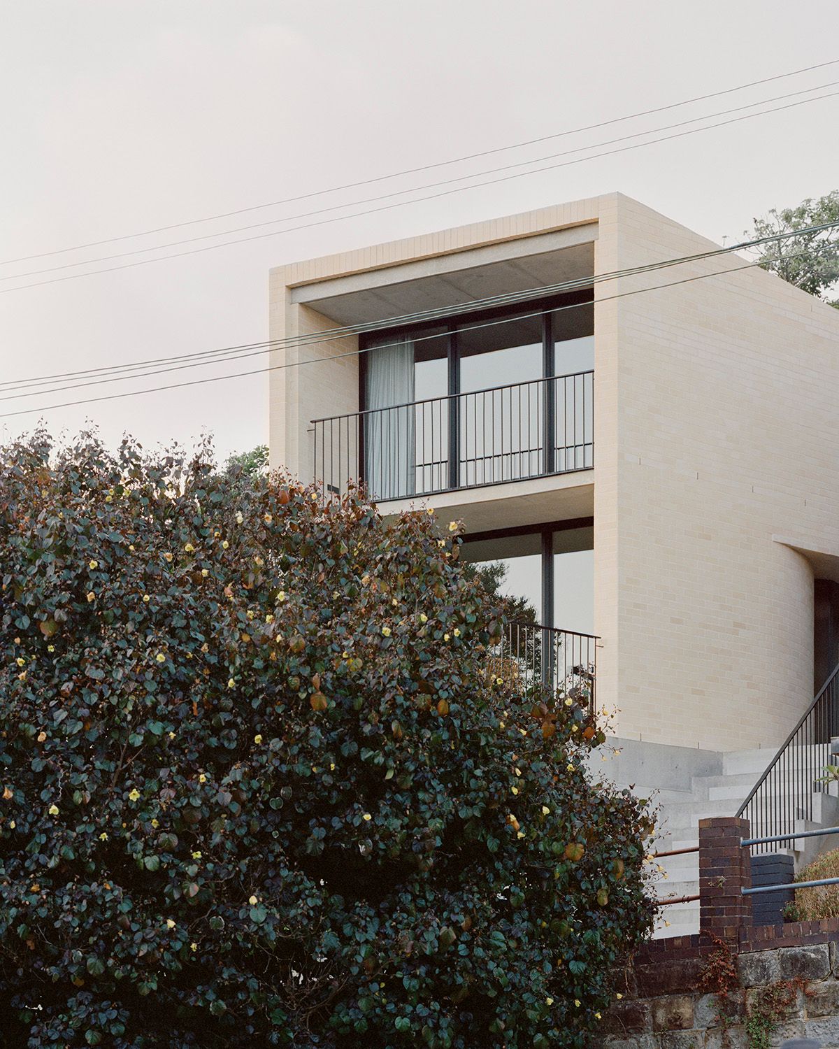 Bronte House by Tribe Studio Architects showing brick external facade