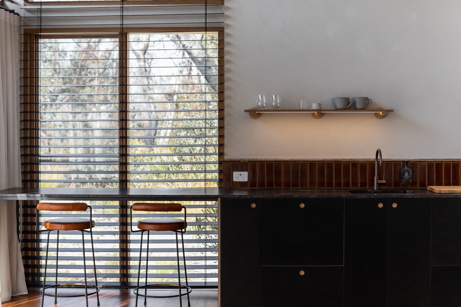 Chalets at Blackheat. View of kitchenette and bar seating. 