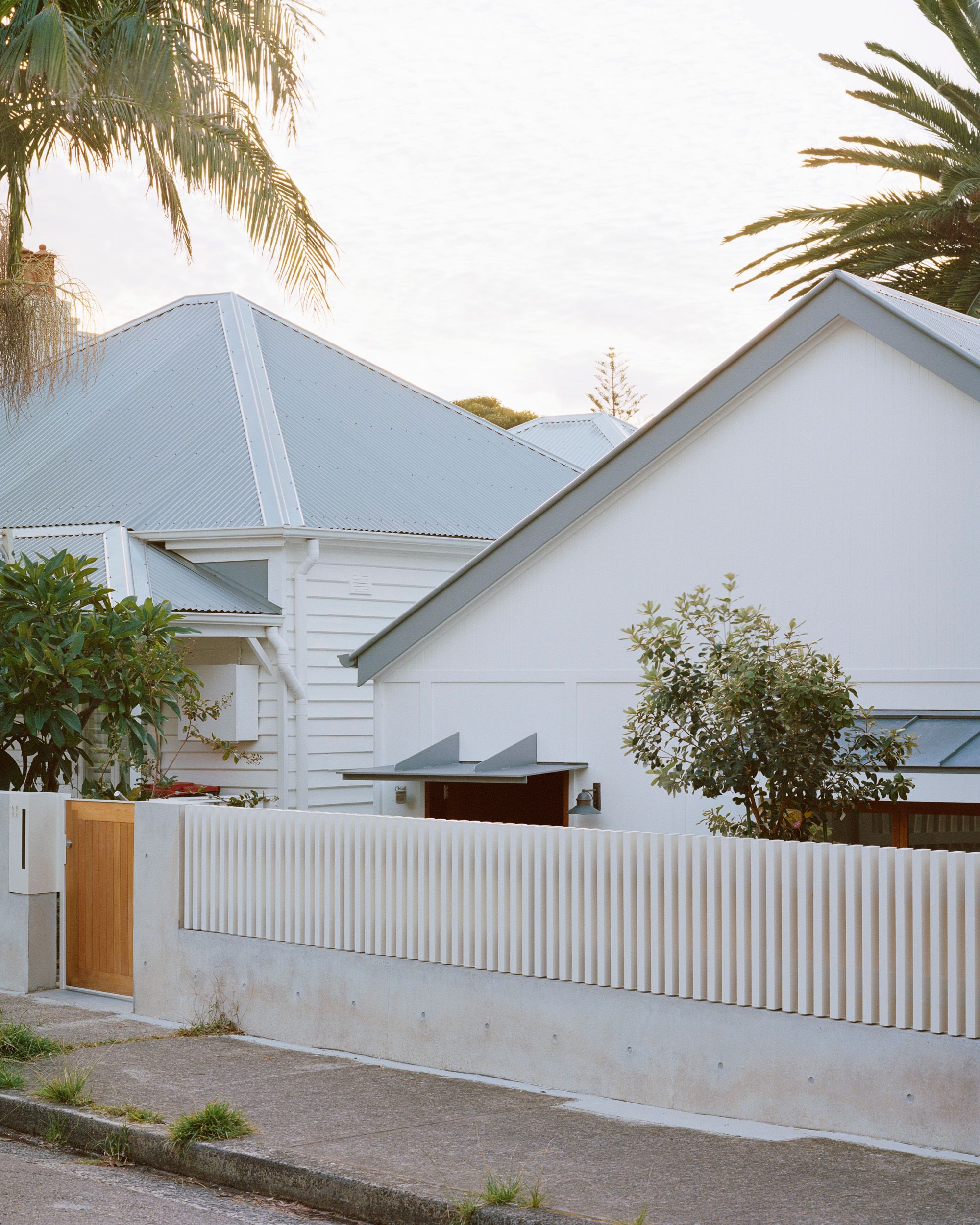 Lee House by Candalepas Associates. Facade view from street, ornamental cottage features brightened with contemporary finish. 