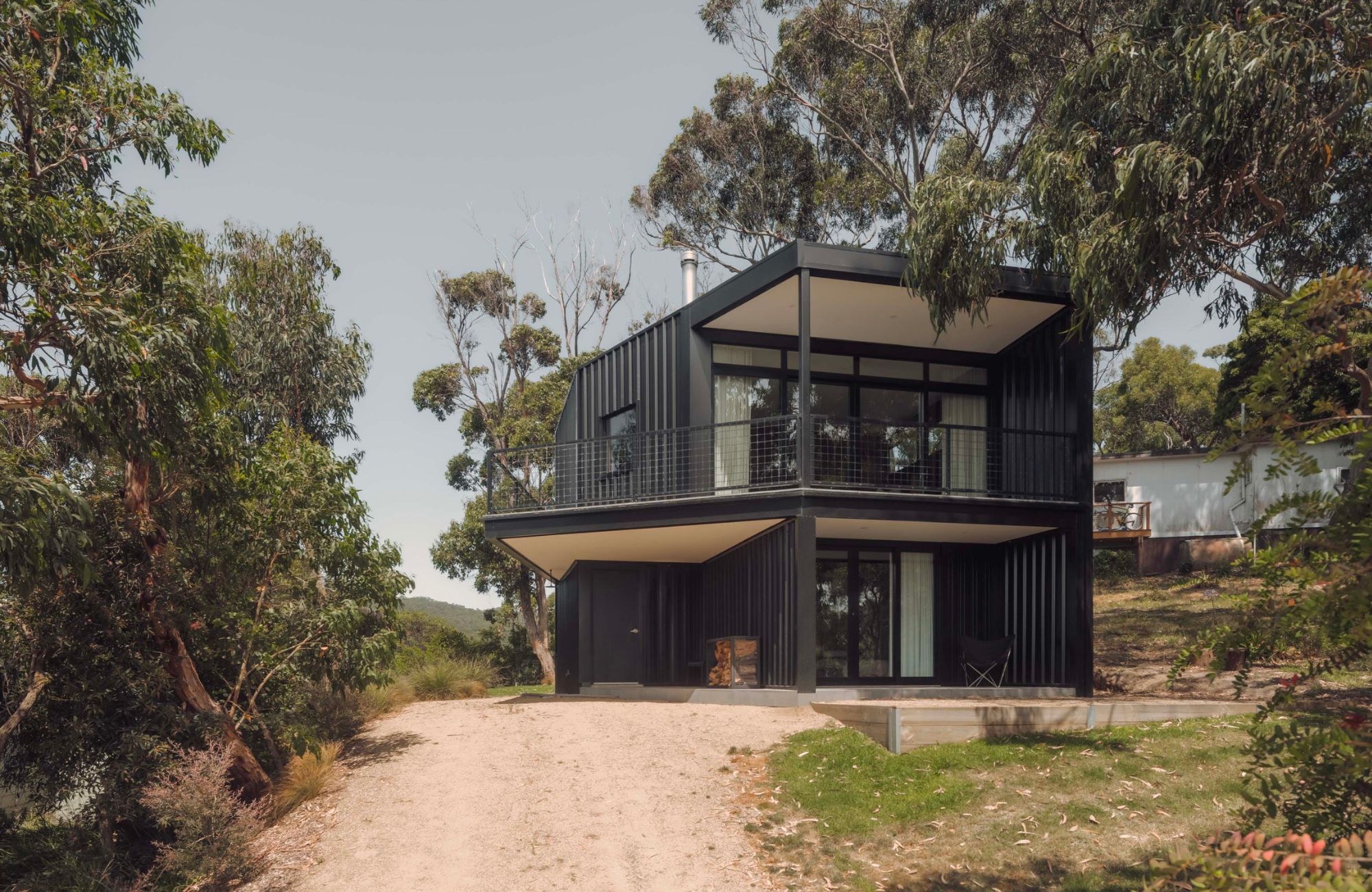 Kennett River House by MGAO showing building in the landscape