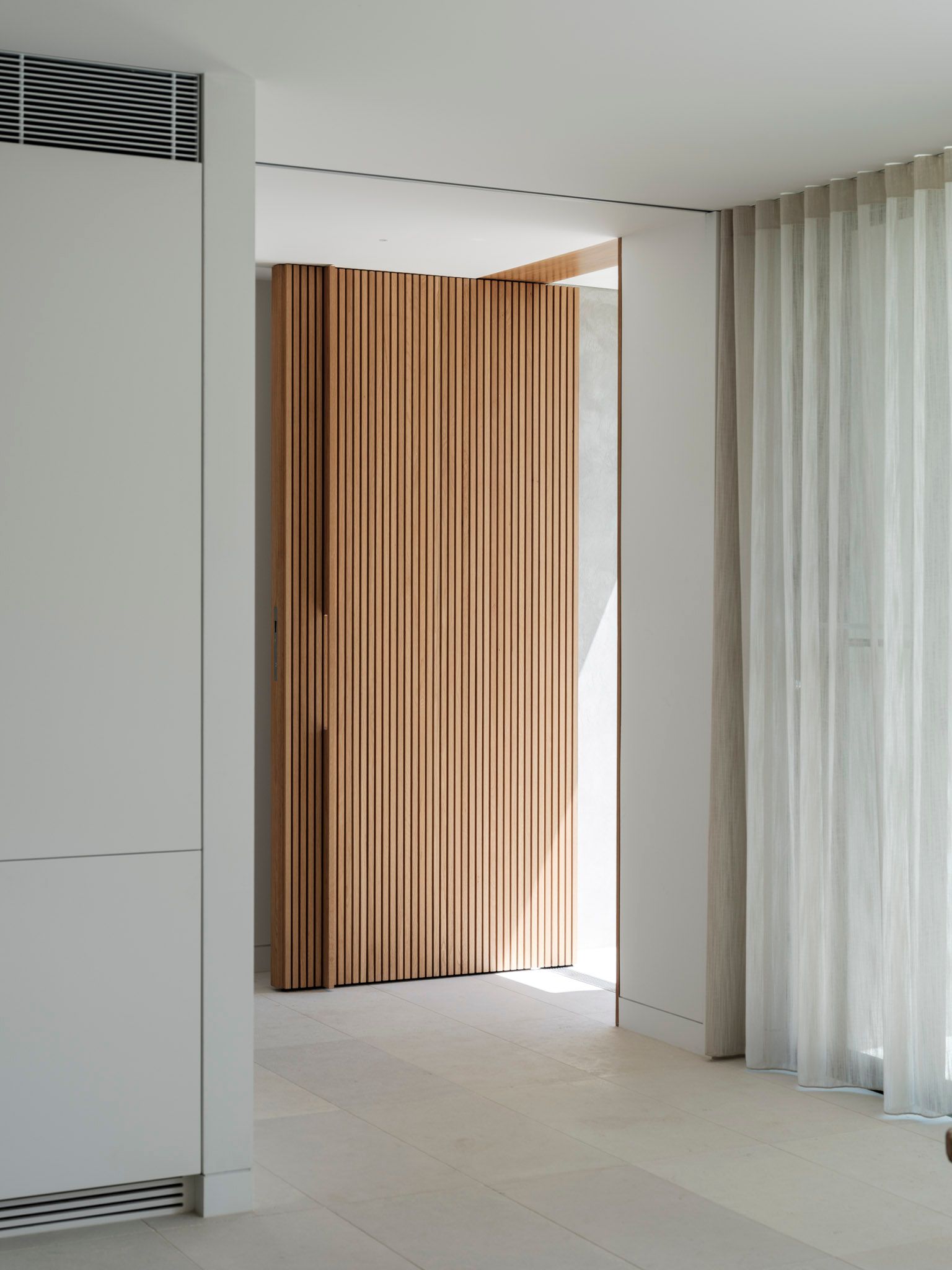 Northbridge by Corben Architects showing timber clad front door
