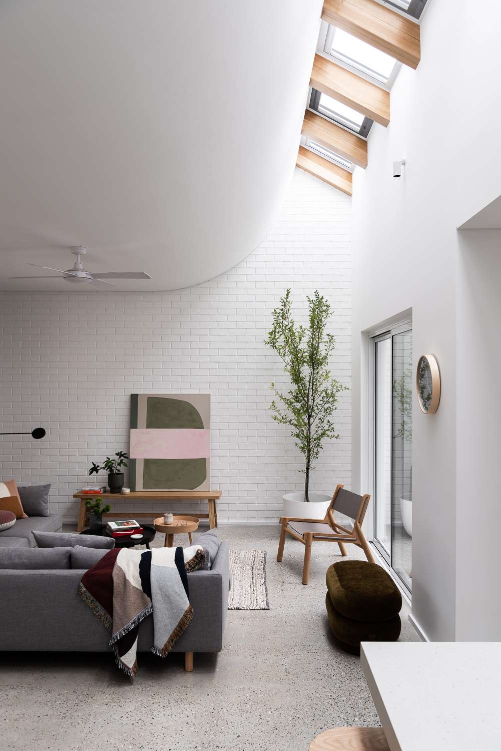 The Third by Dalecki Design showing interior space with large skylight