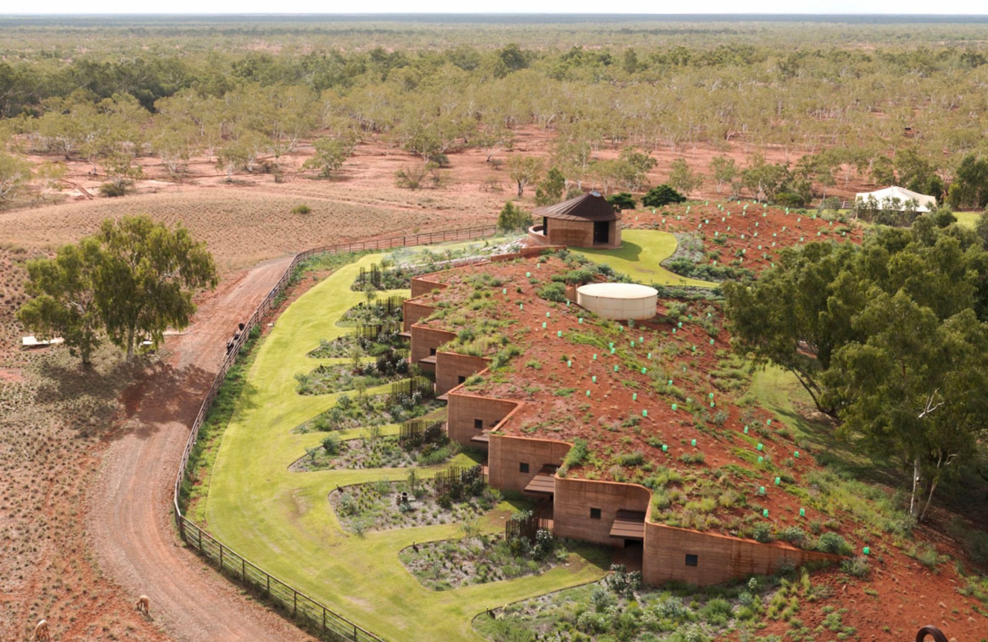 The Great Wall by Tim Davies Landscaping showing the hotel design with a green roof