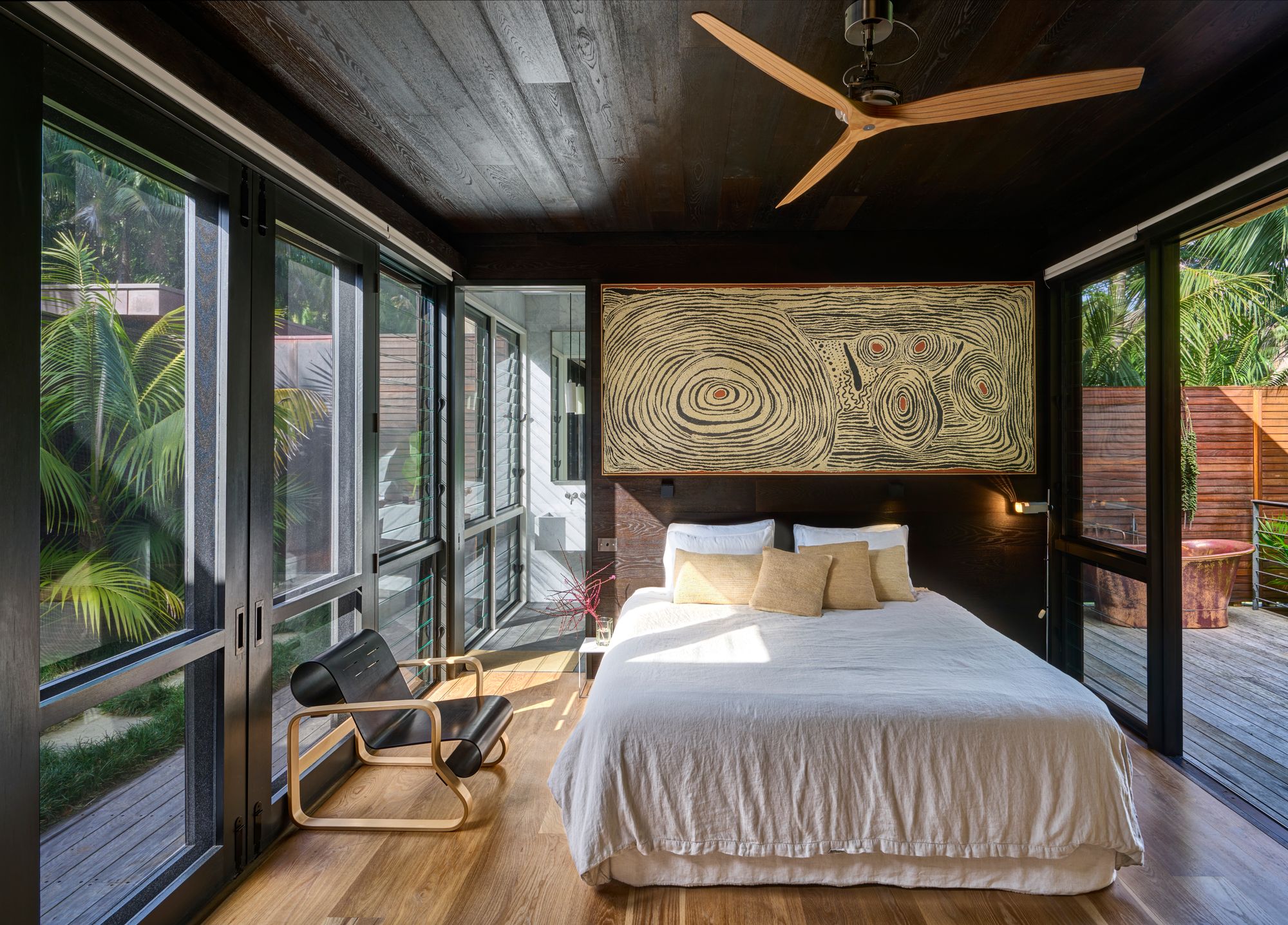 Island House, Lord Howe Island showing dark bedroom space that has access to timber deck