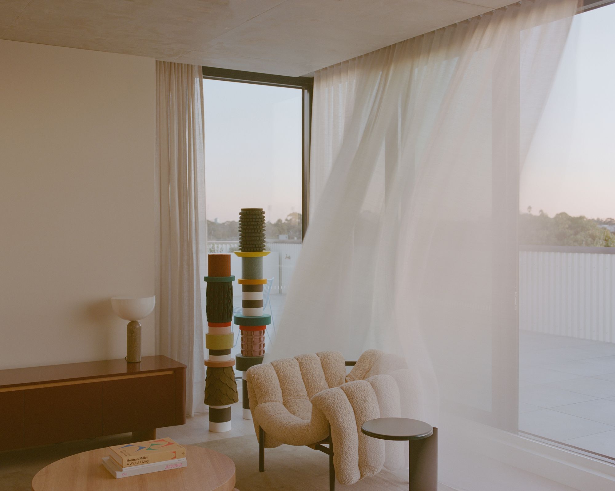 Brunswick East for Milieu by Foolscap Studio and Fieldwork. Detailed view of Living area, looking out to private outdoor area. 