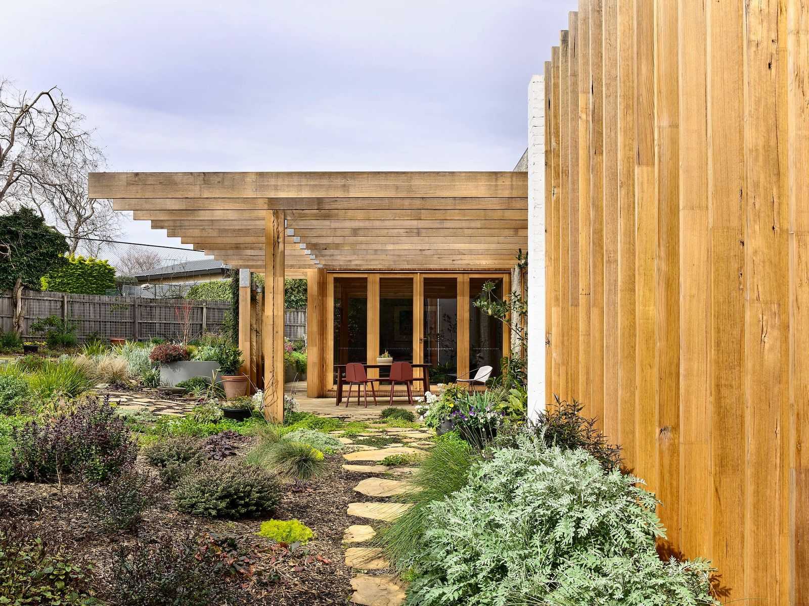Local House by Zen Architects showing native garden design with outdoor courtyard area