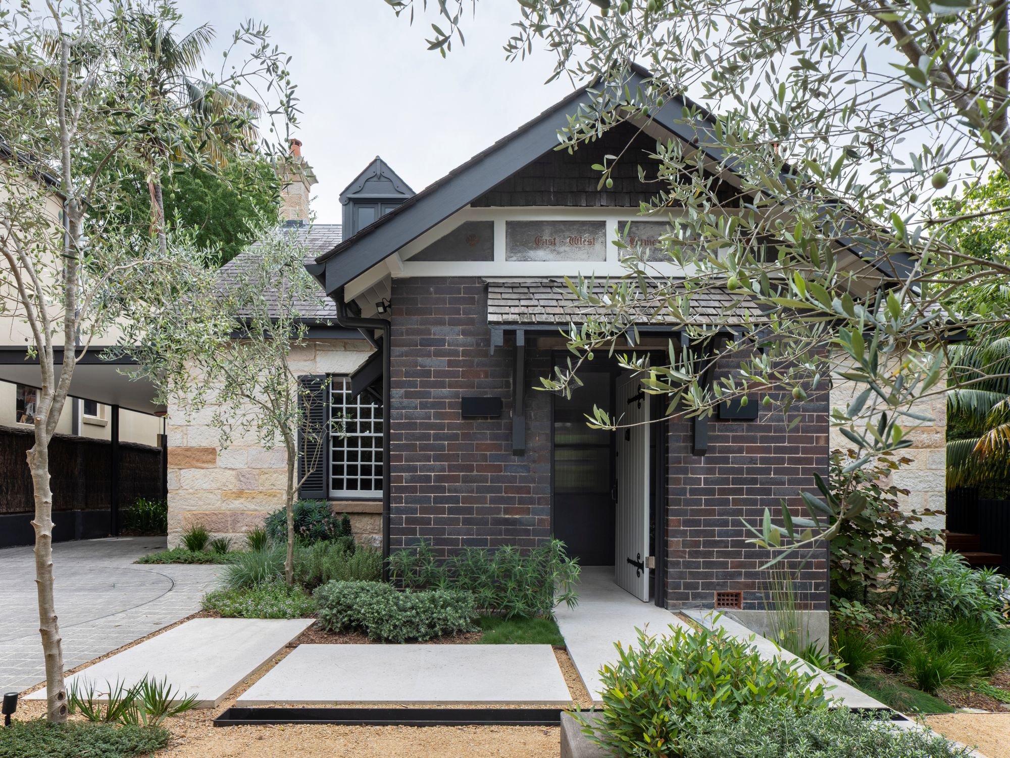 Maranatha House by Bijl Architecture. Façade view, picturing entrance to home. 