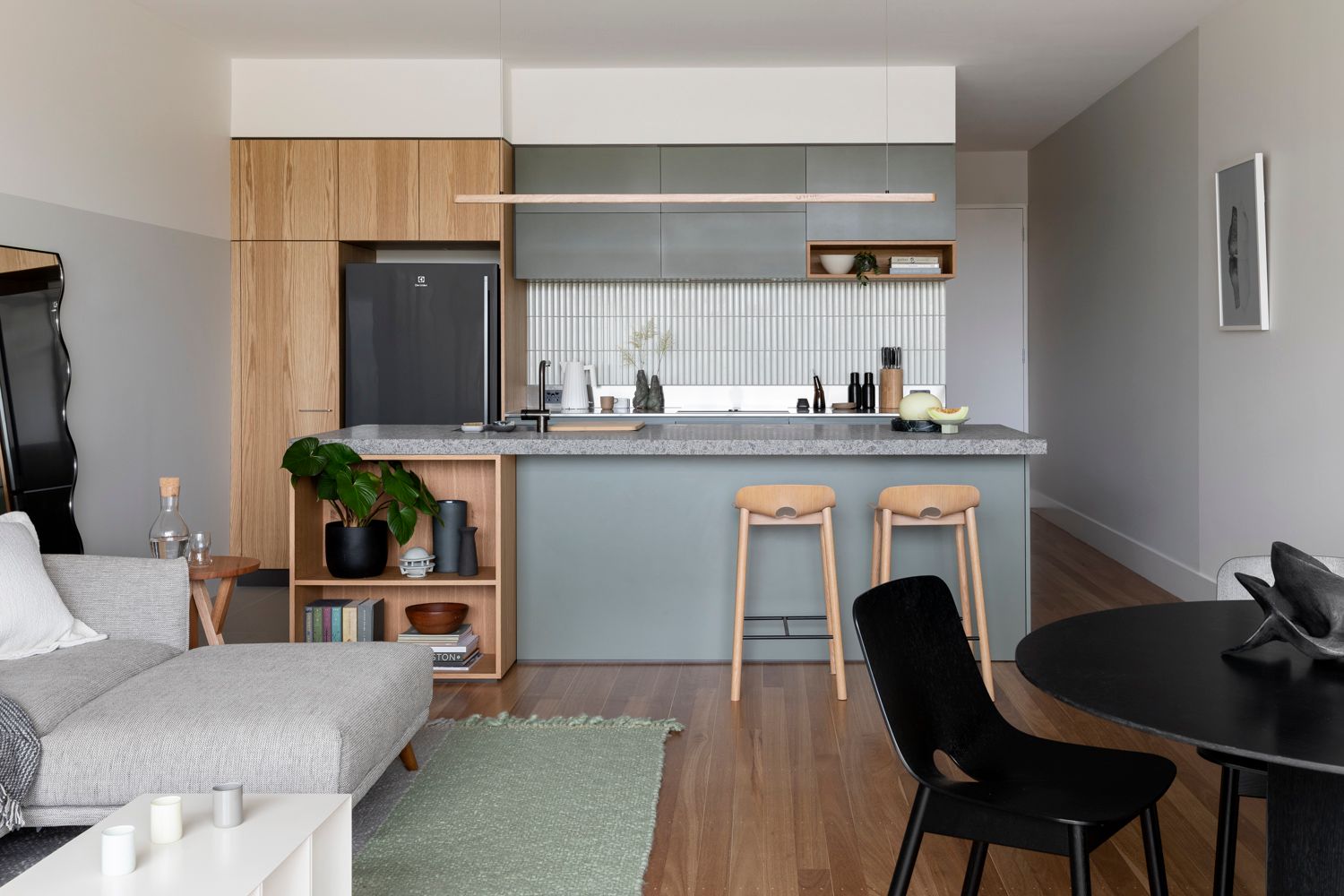 Fluxwood Hollow Pendant. Photography by Martina Gemmola. The Hollow is a versatile solid timber pendant. The singular LED strip lighting creates a functional yet statement light source that is perfect over kitchen islands and workspaces like it is positioned in this setting above kitchen island bench 