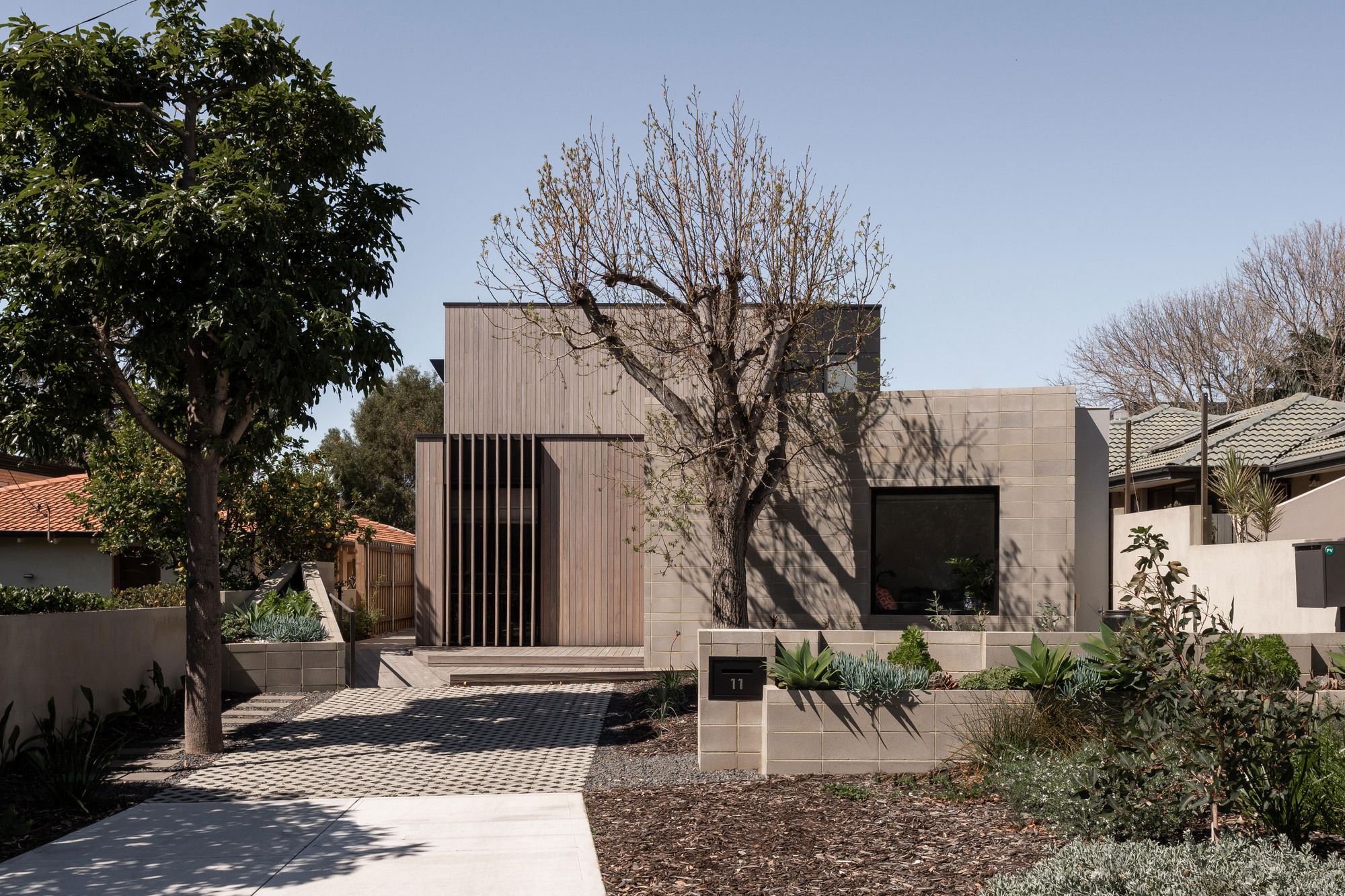 Mosman Park House by Robeson Architects showing timber exterior and garden design