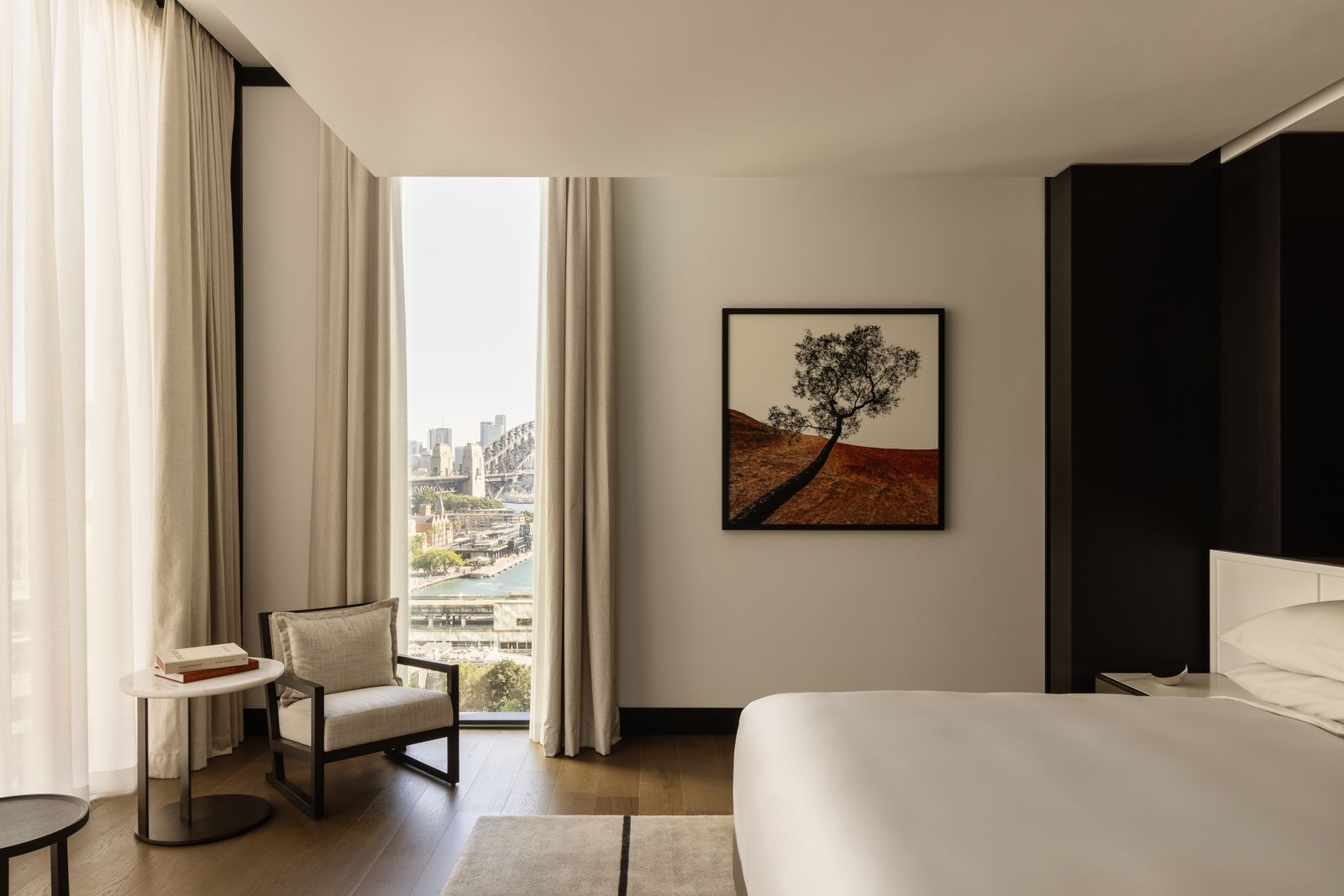 Capella Sydney, Prestige Suites, Liberty Suite showing the interior of the bedroom
