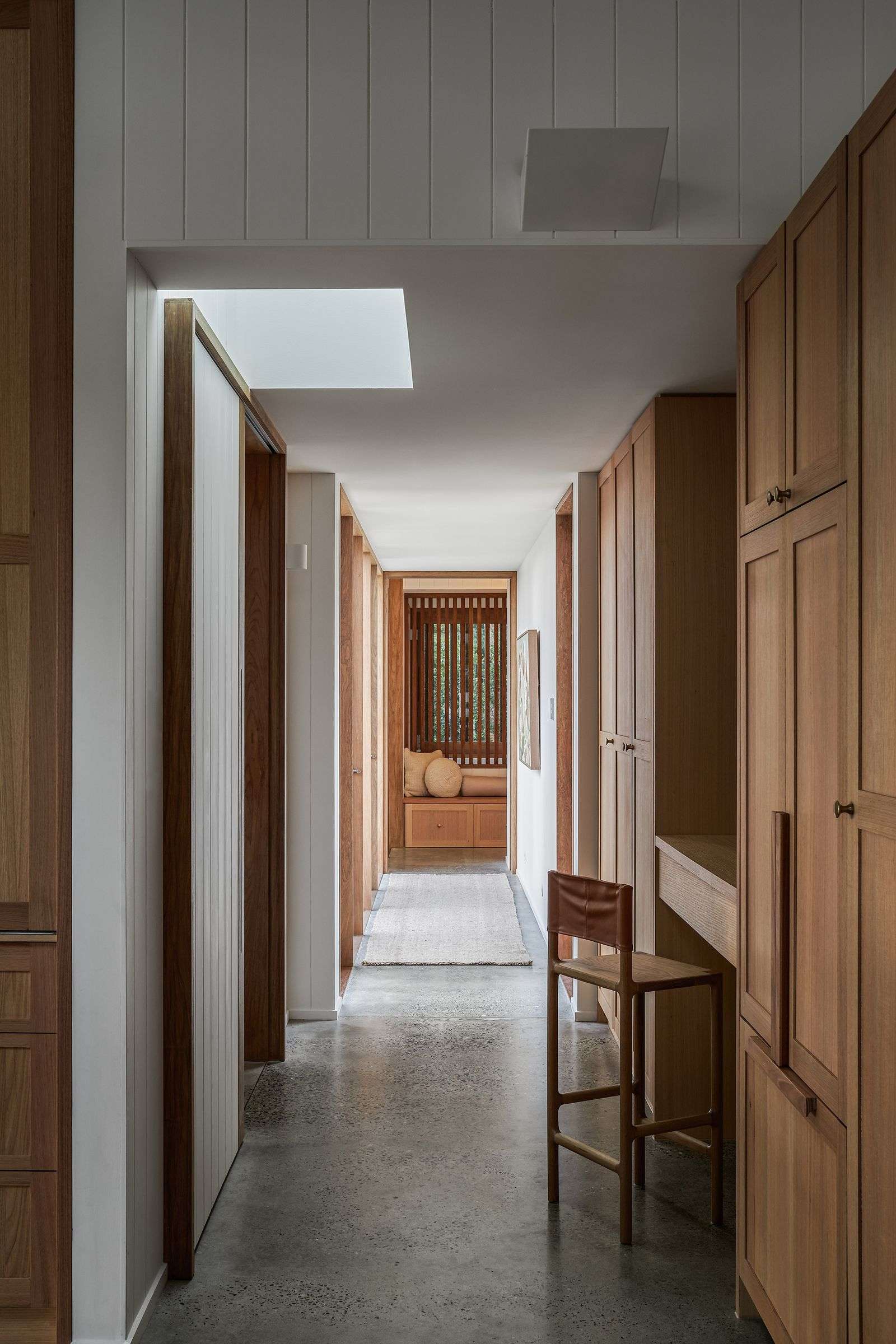 The Caretaker's by Aphora Architecture showing the hallway view