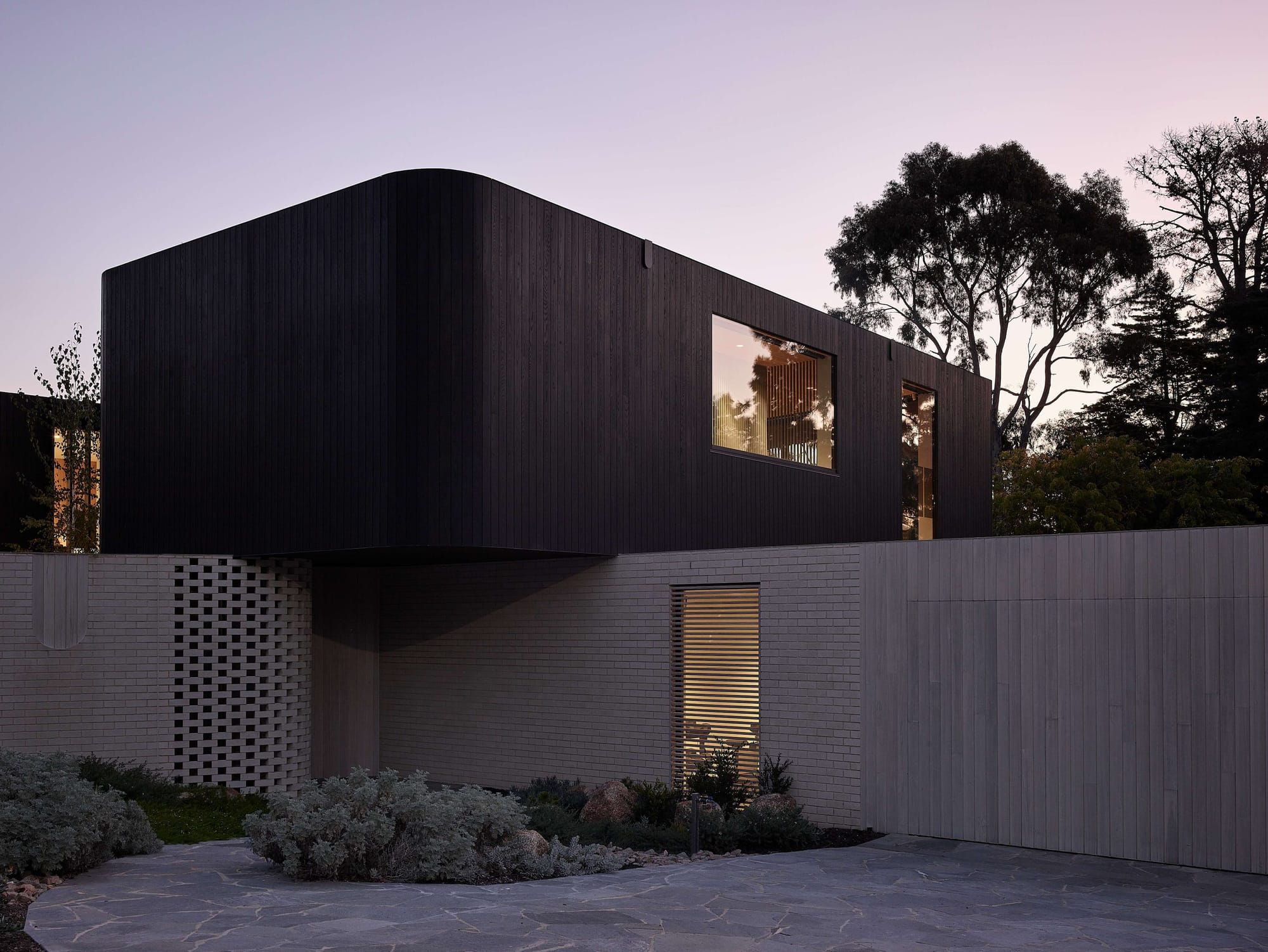 Brimar House by MODO showing front elevation of the two storey house 