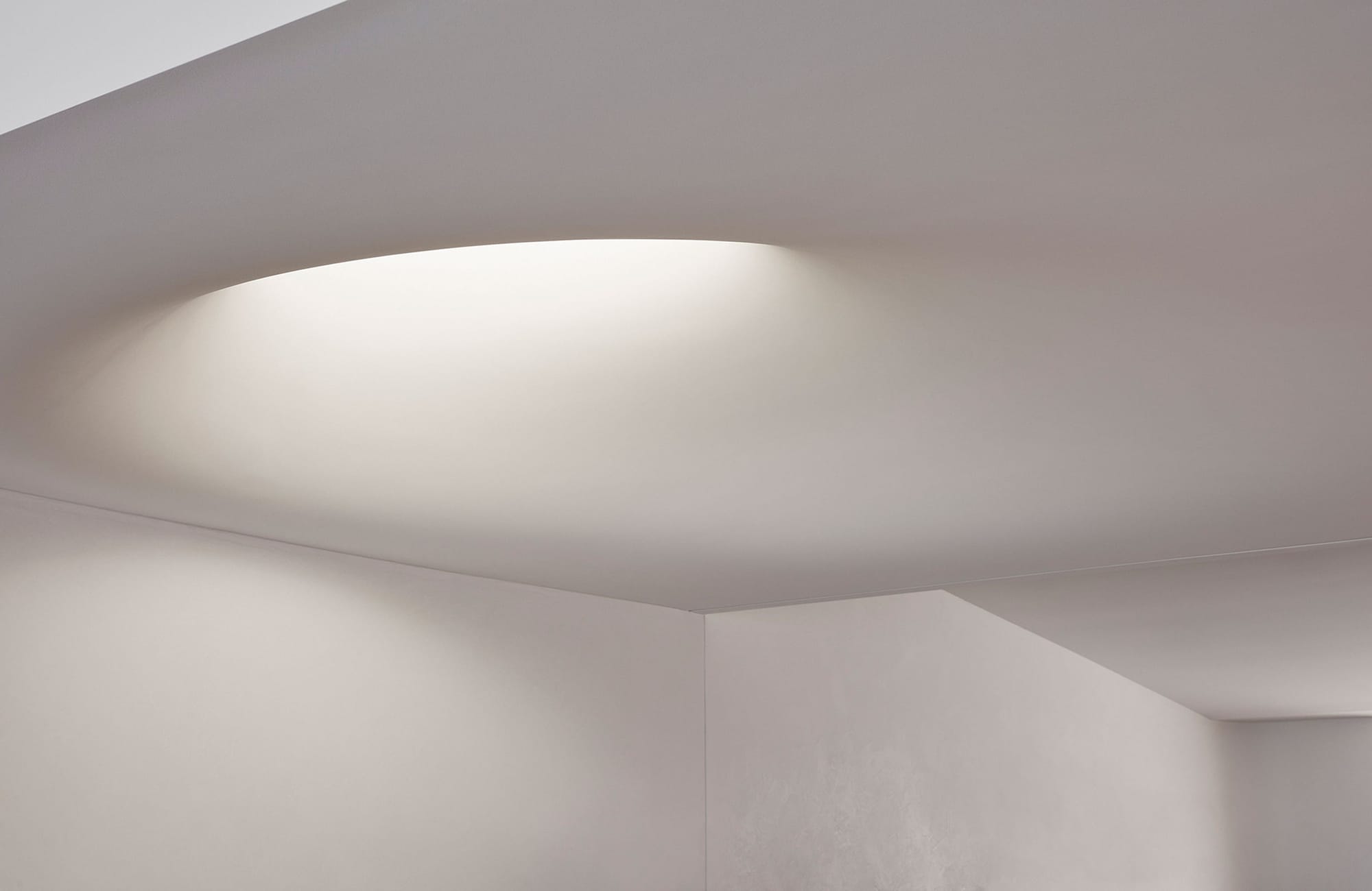 Arc Side by Jolson. Photography by Lucas Allen. Detail shot showing the curved plasterboard skylight above the feature staircase.