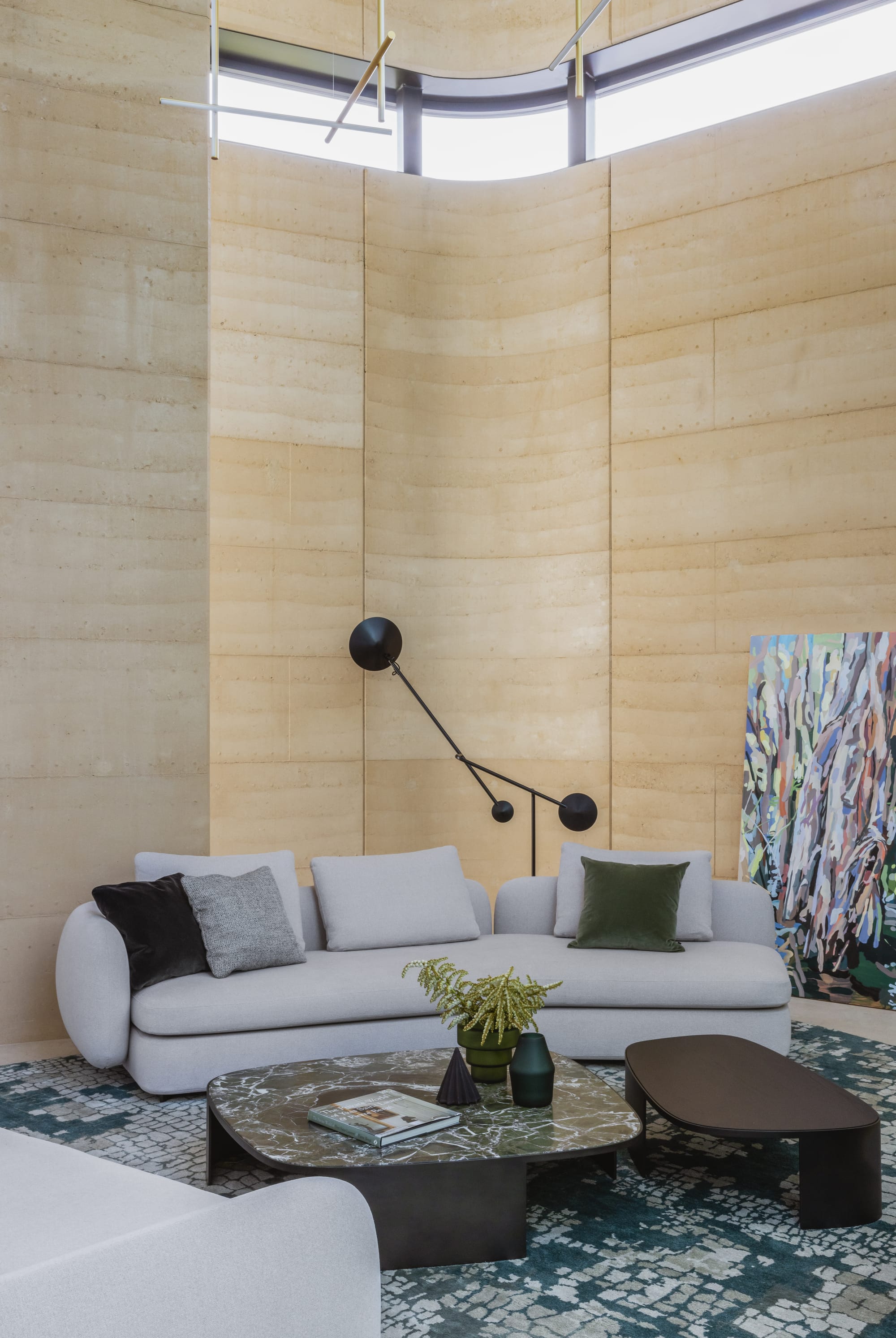Kenneth Street by Design Studio Group showing the internal rammed earth walls and living room space