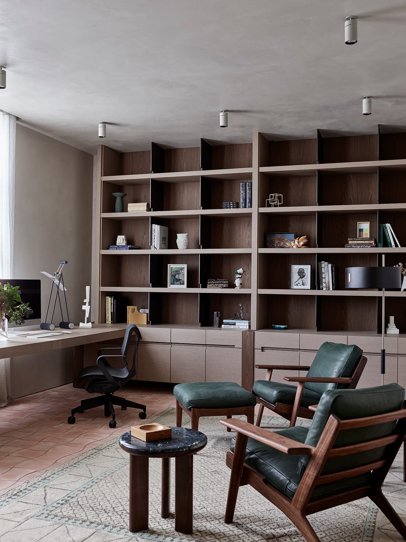 Terra Firma by RobsonRak showing the interior of the modern home office and timber joinery and leather seats