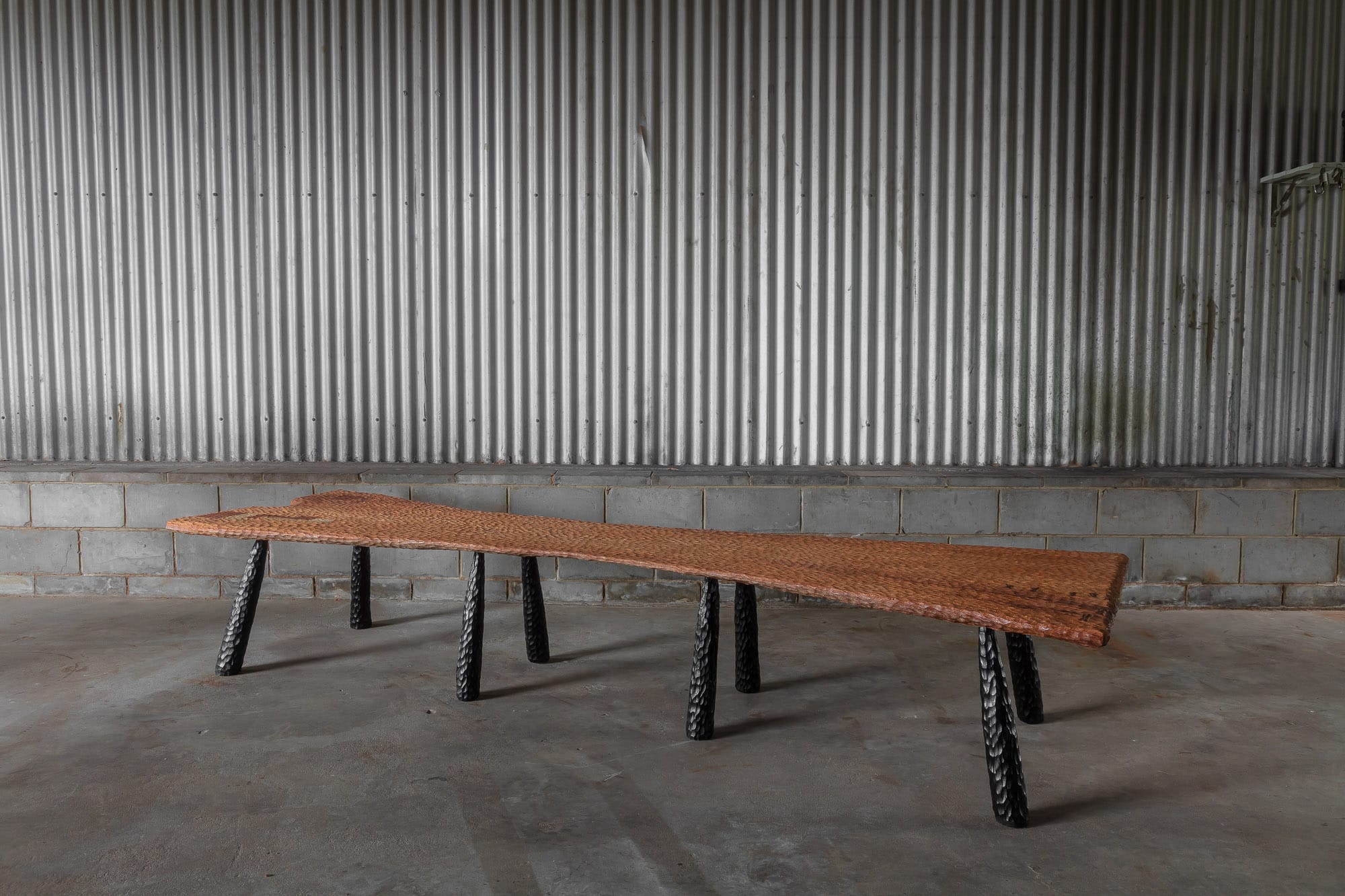A styled shot of The Benson Long Bench by Two Blue Boys Furniture