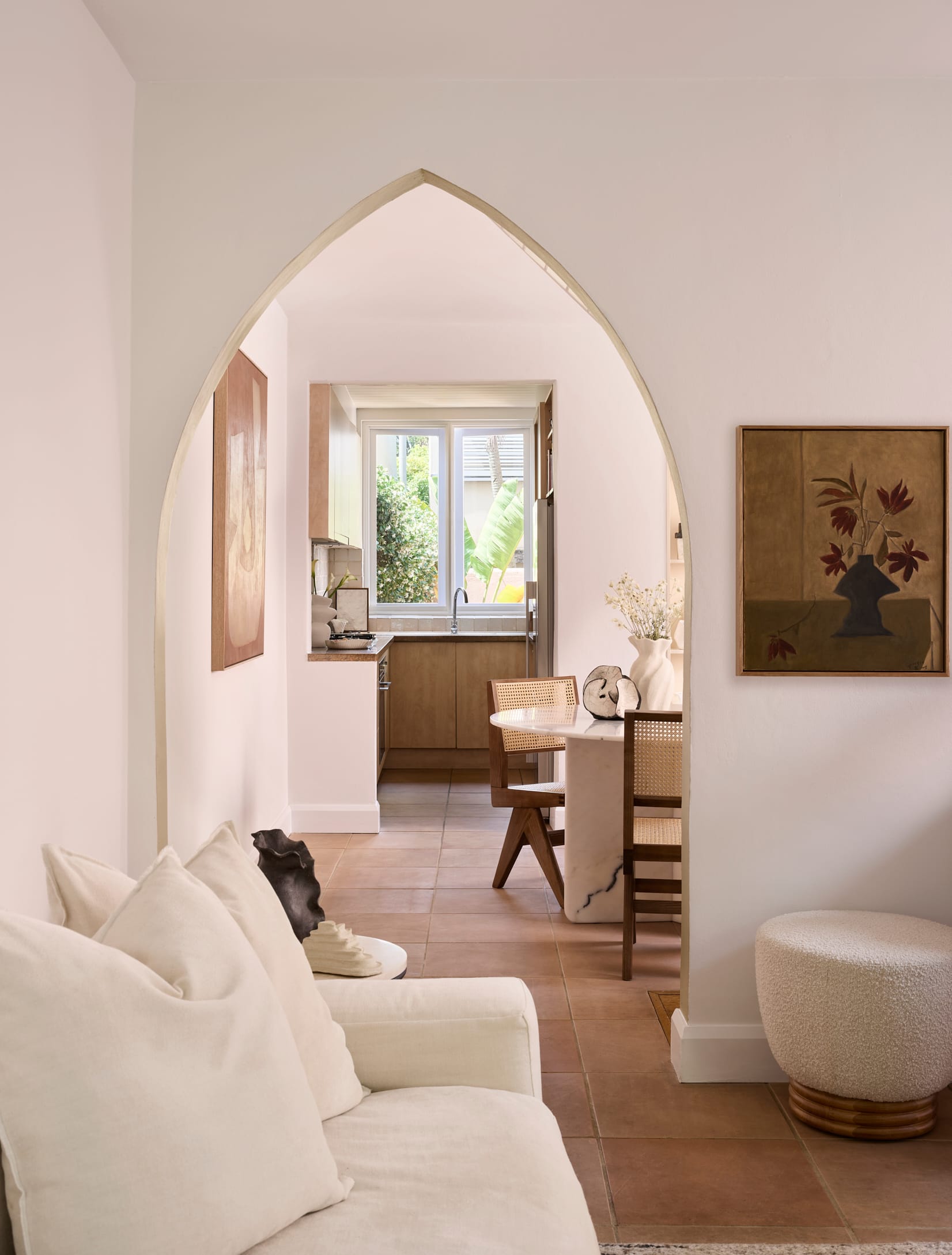  Chapel House by FURNISHD. Photography by Alicia Taylor. Pointed archway joining living room to kitchen and dining room. 